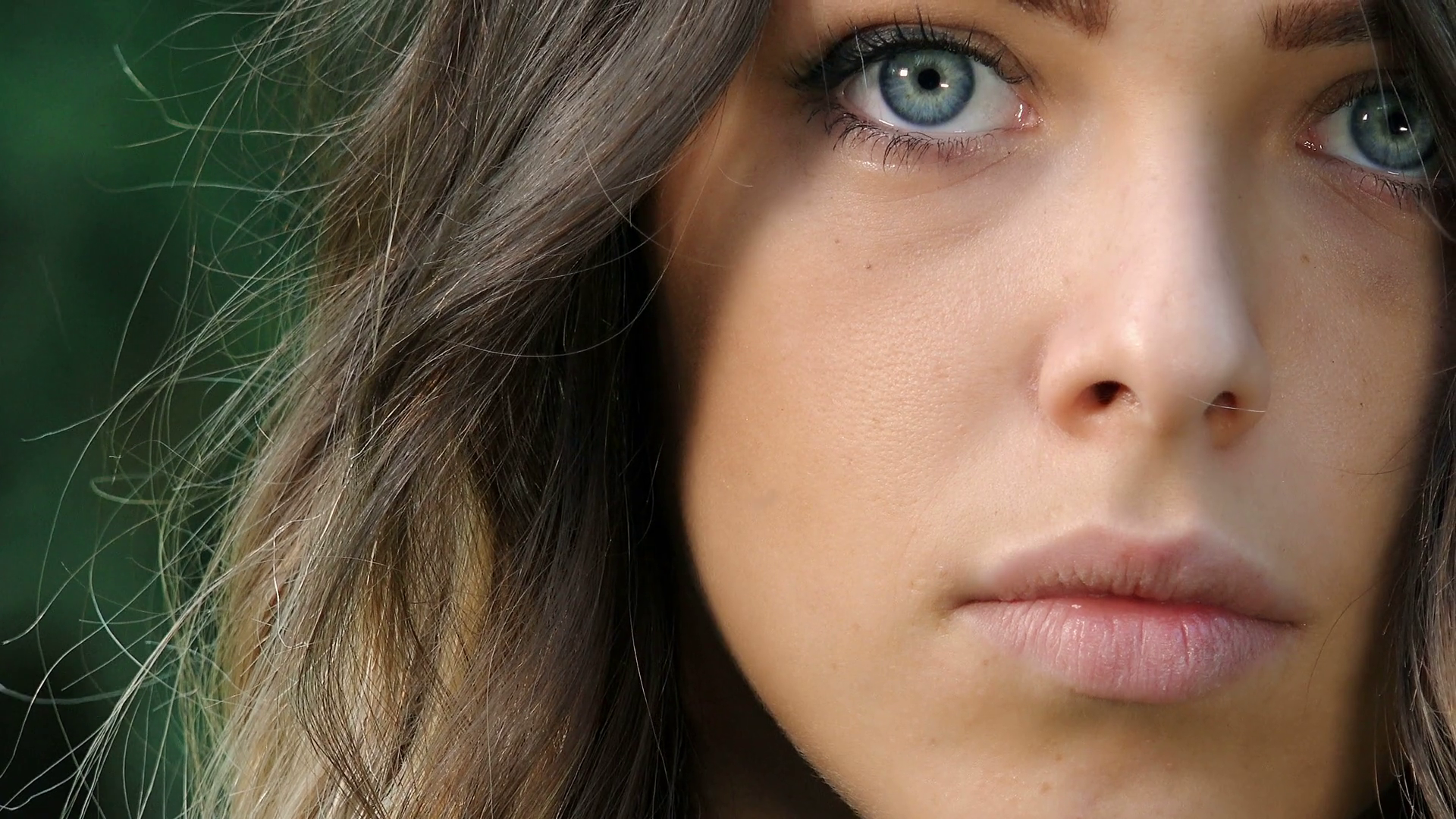 View of beautiful girl with blue eyes: closeup portrait Stock Video ...