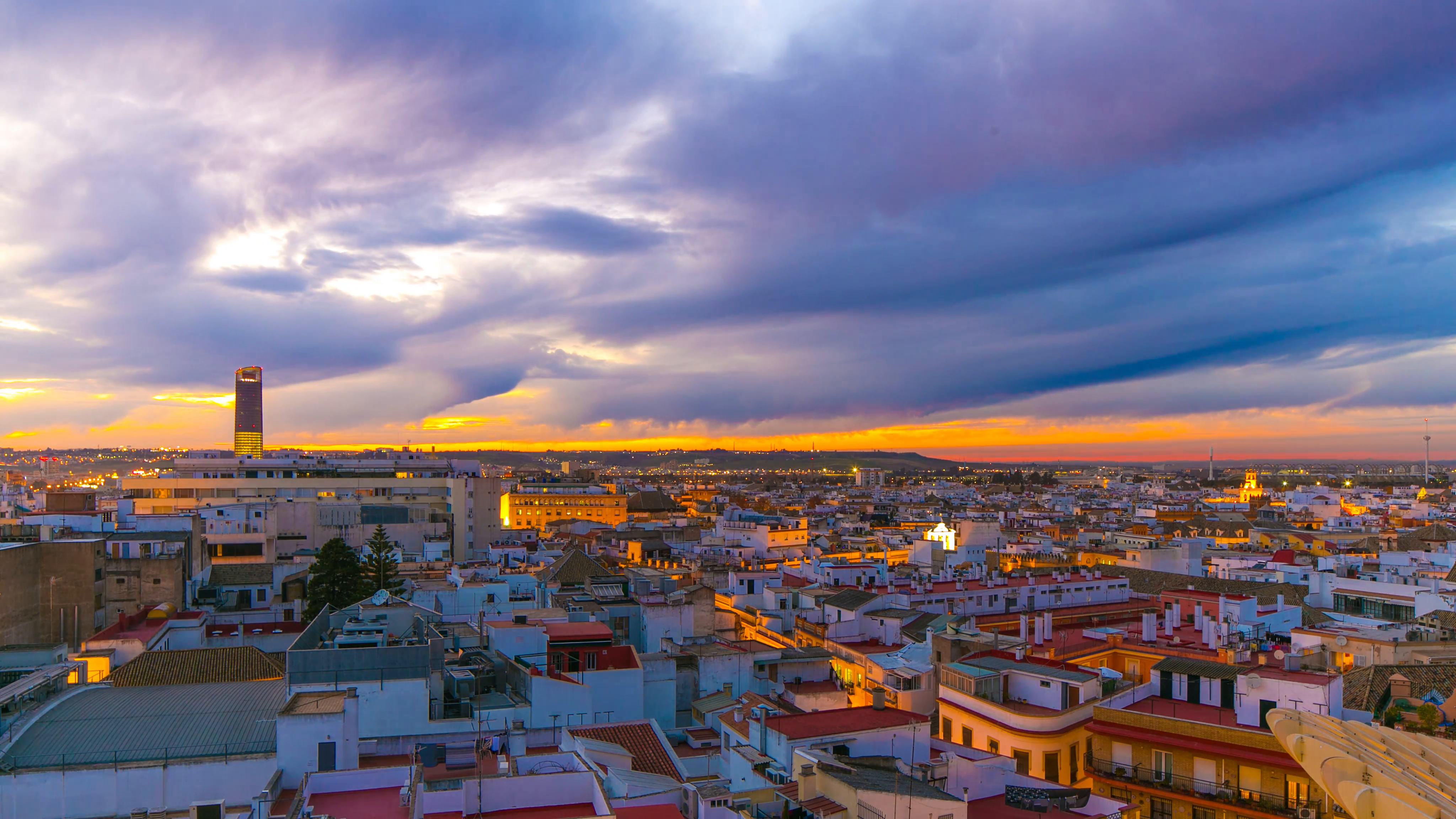 seville beautiful sunset city panorama from the roof top 4k time ...