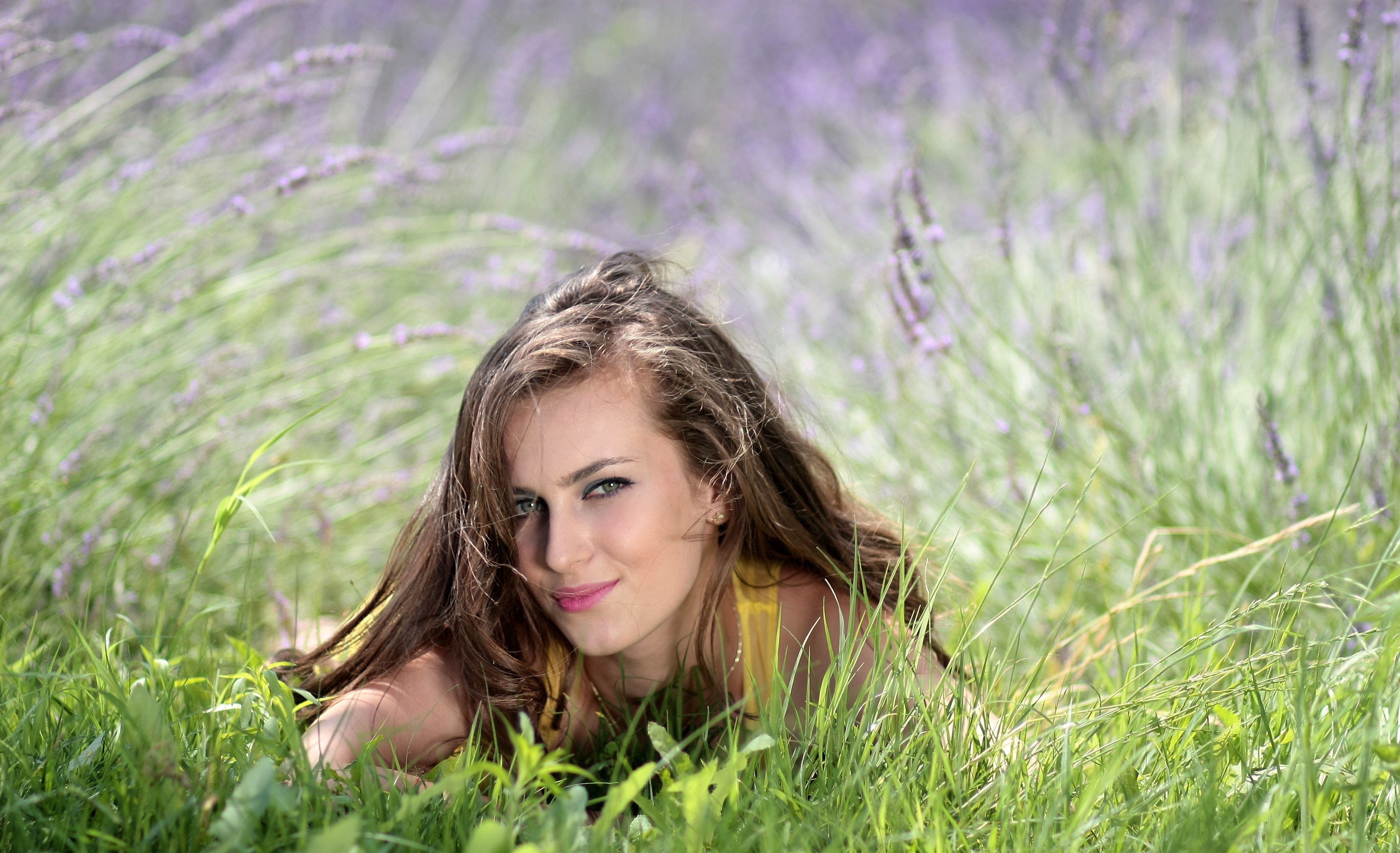 Beautiful woman on grass photo