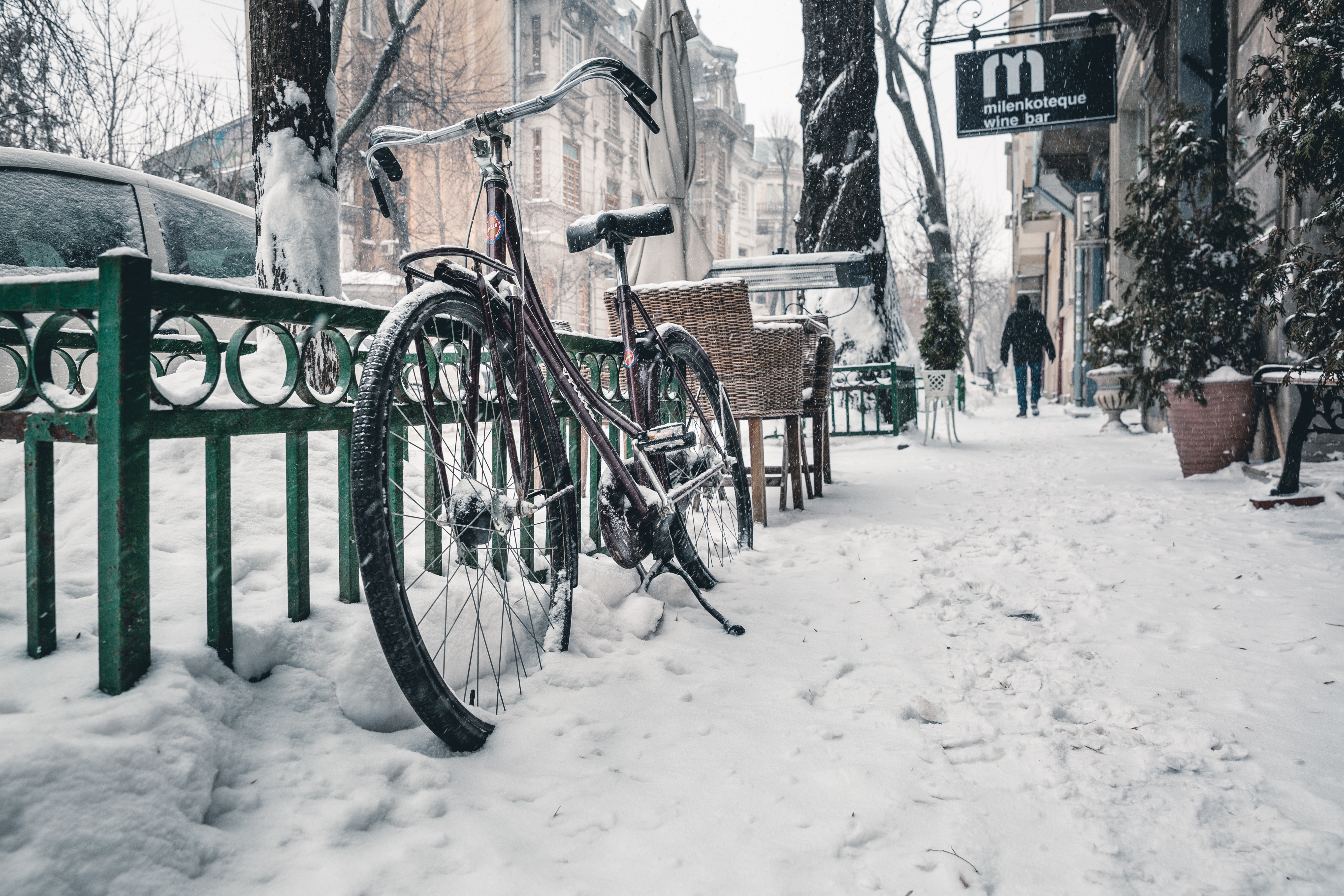 Bicycle on snow covered street photo