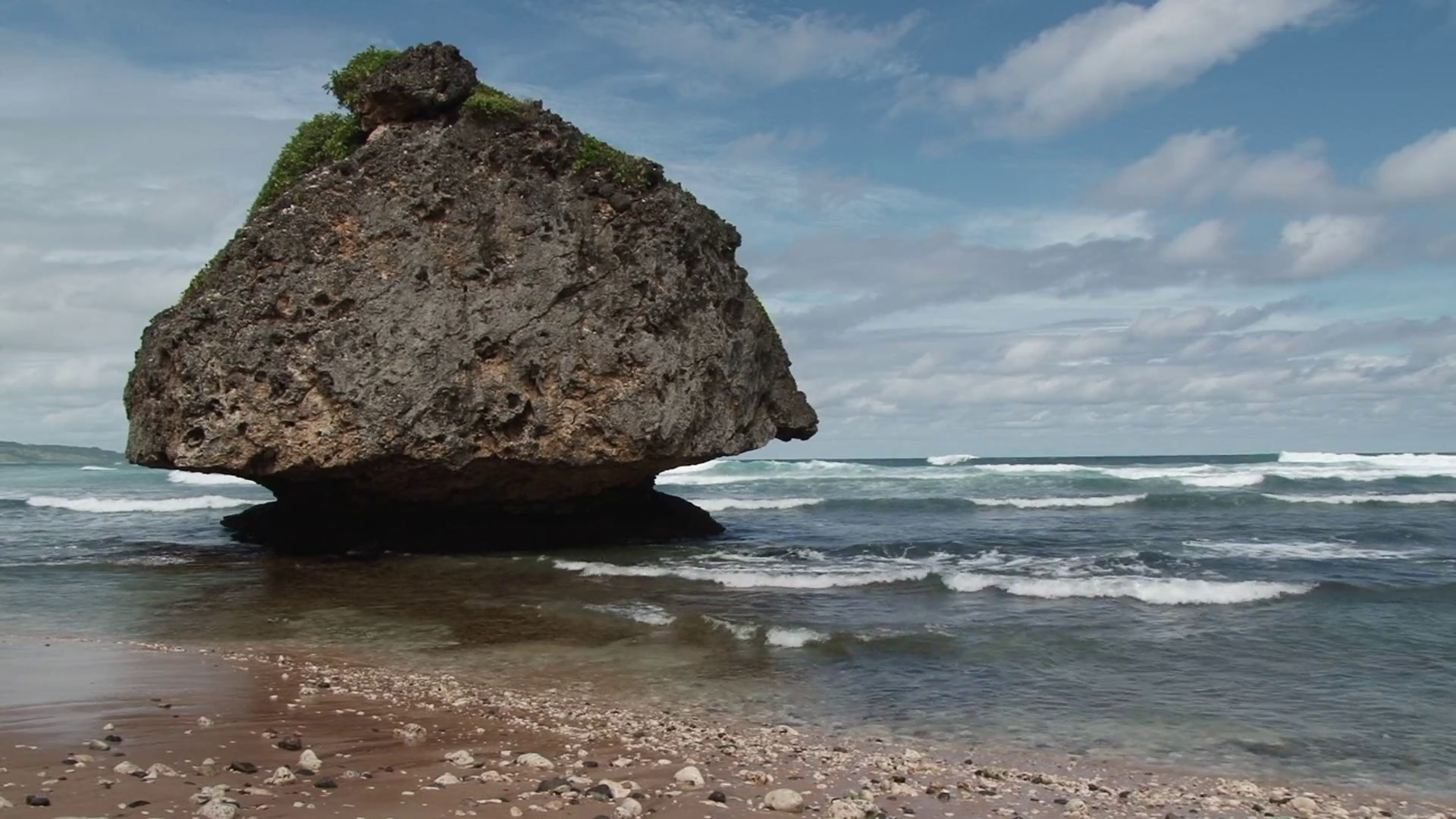 Big boulder on the Bathsheba beach on east coast of Barbados Stock ...