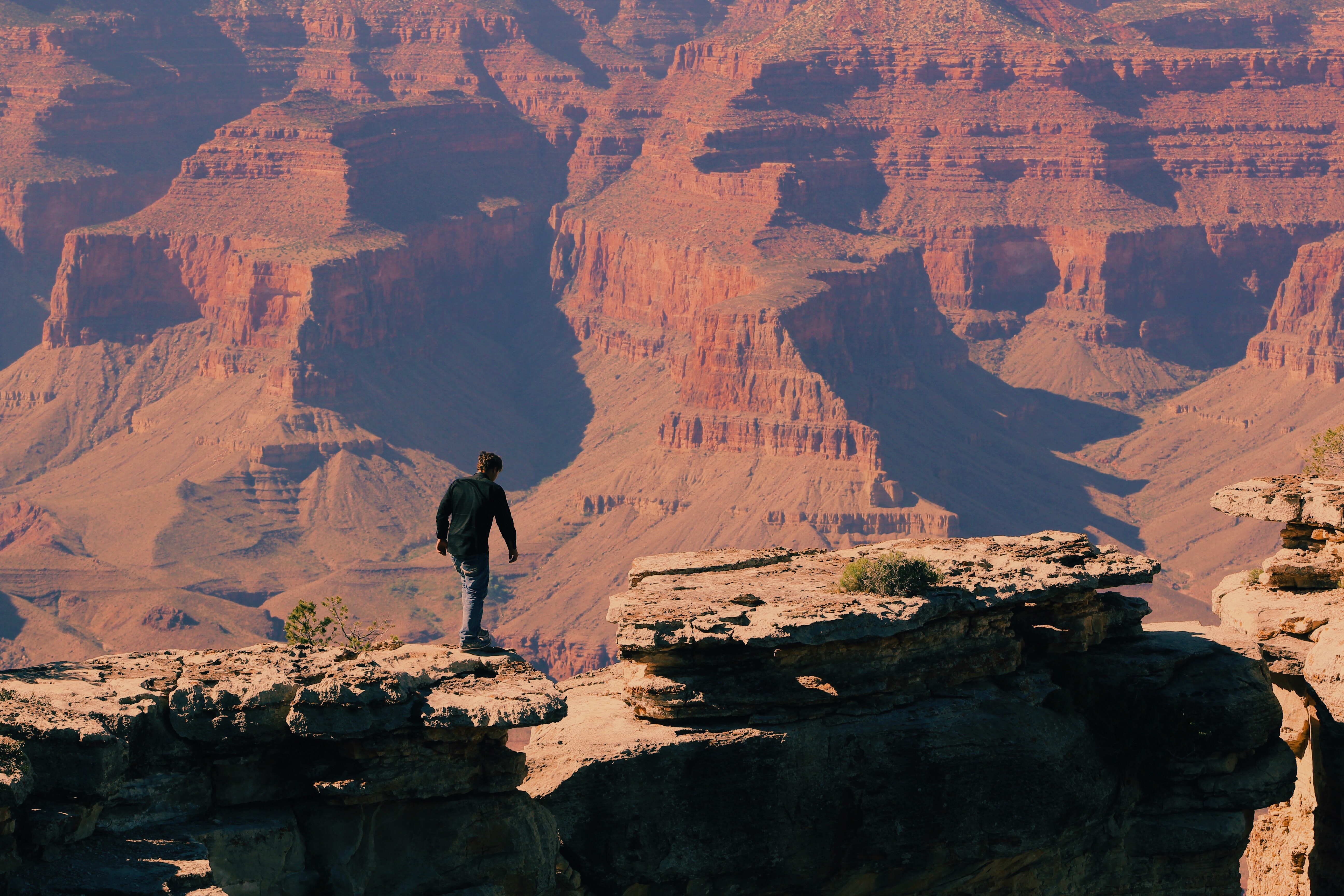 Bird's eye-view of a man on grand canyon mountain photo