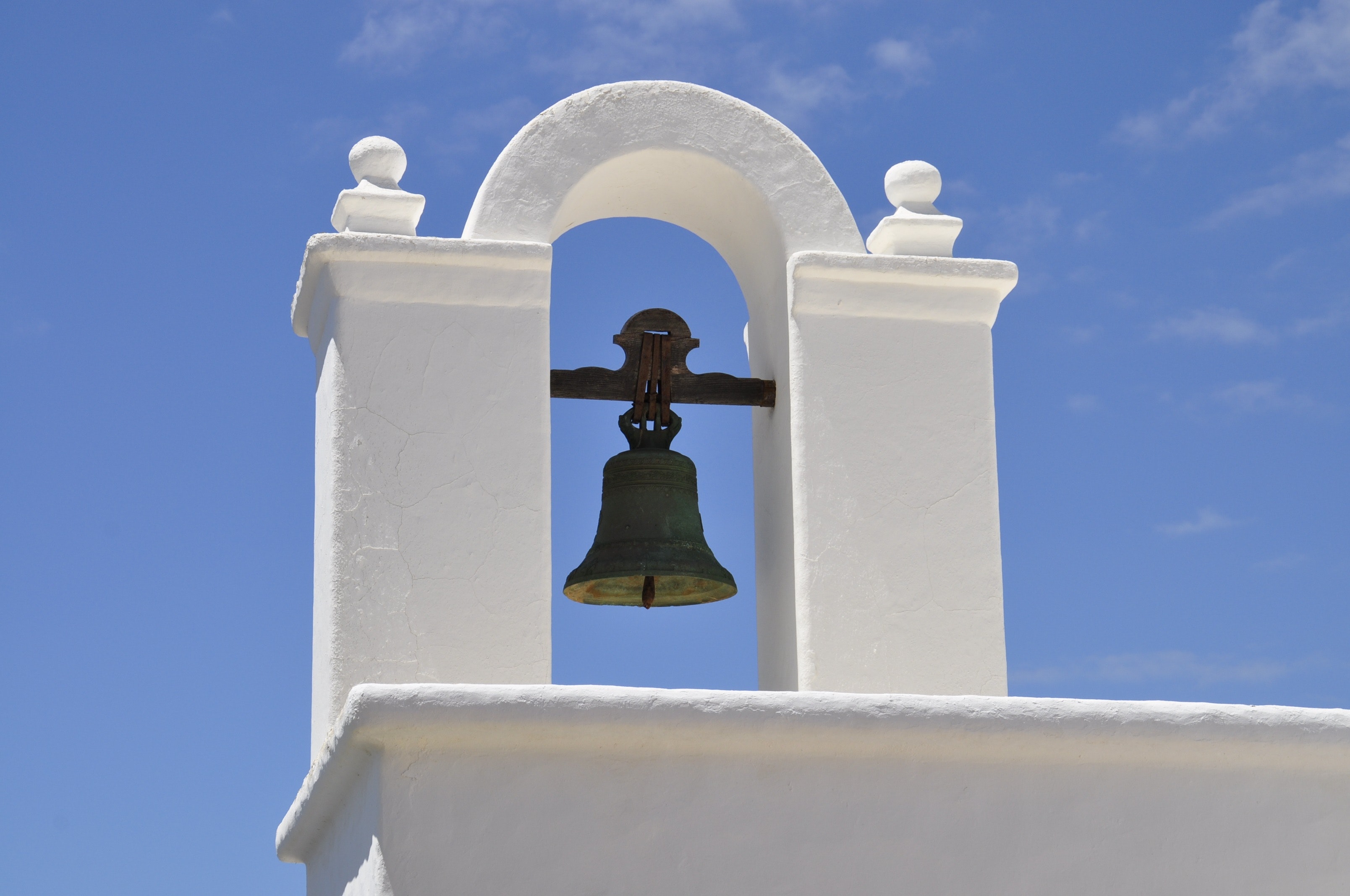 Black bell during daytime photo