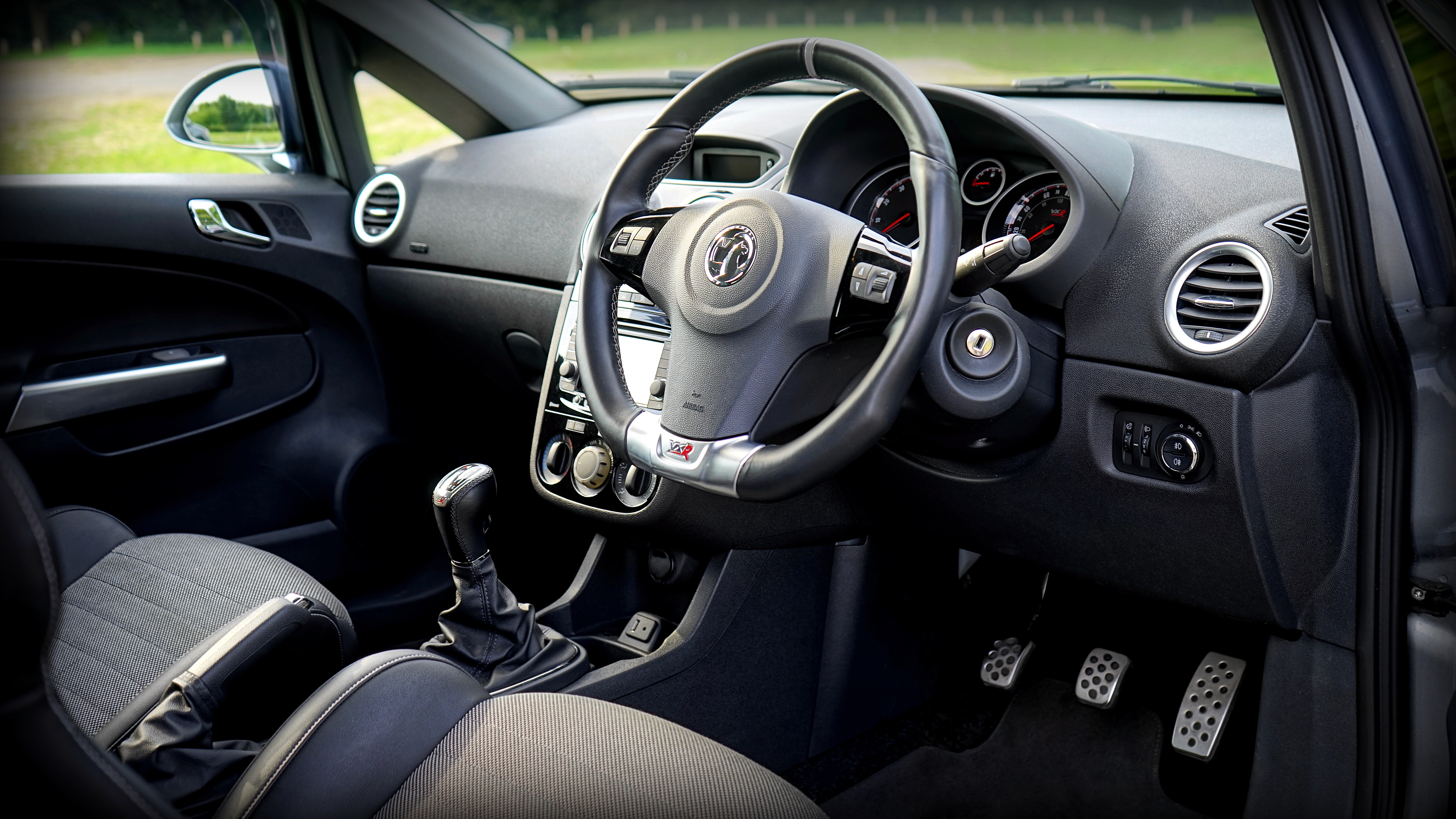 Black car steering wheel photo