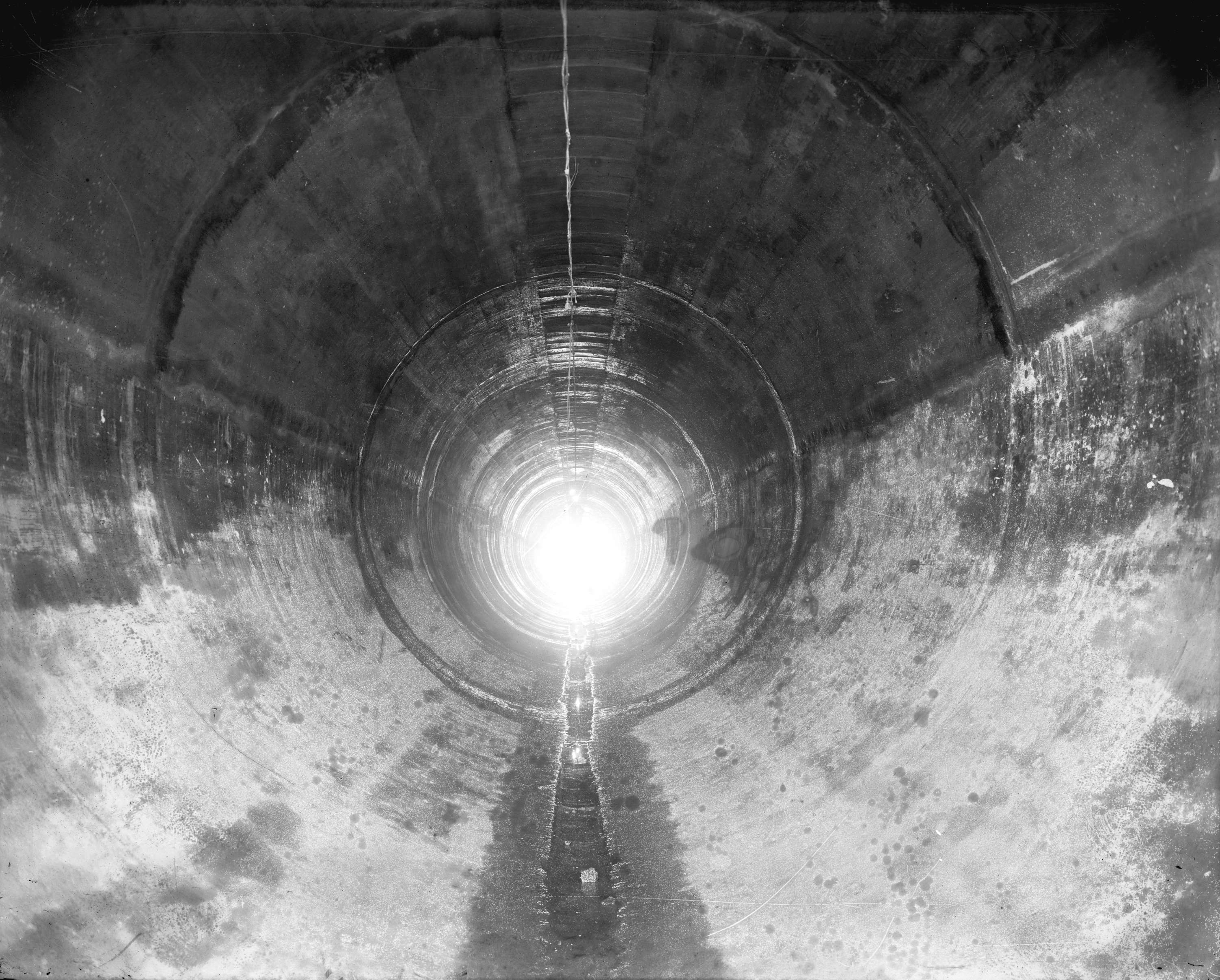 Interior of concrete lined hydraulic tunnel from Buntzen Lake for ...
