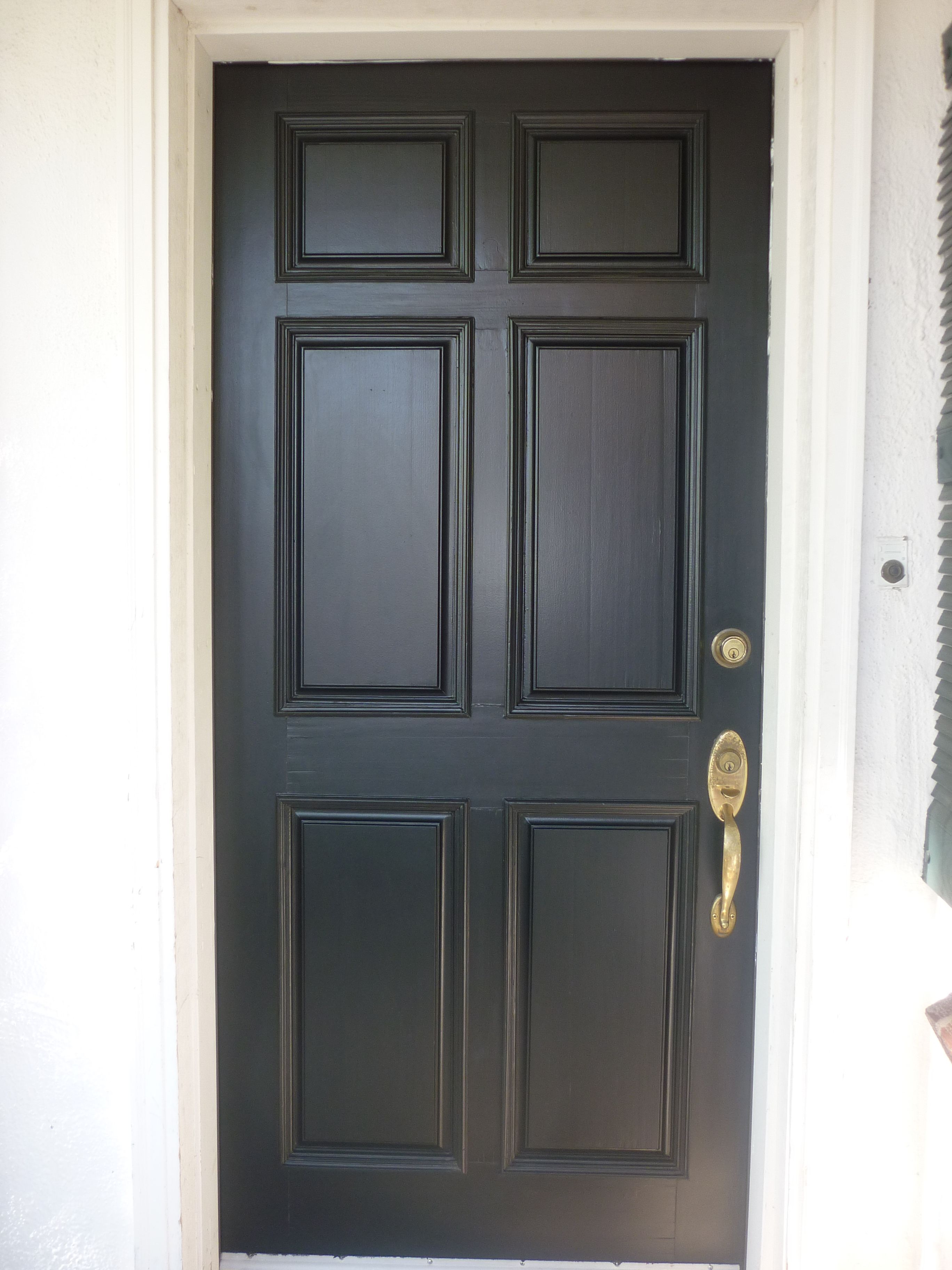 There's Just Something About a Black Front Door | Front doors, Doors ...