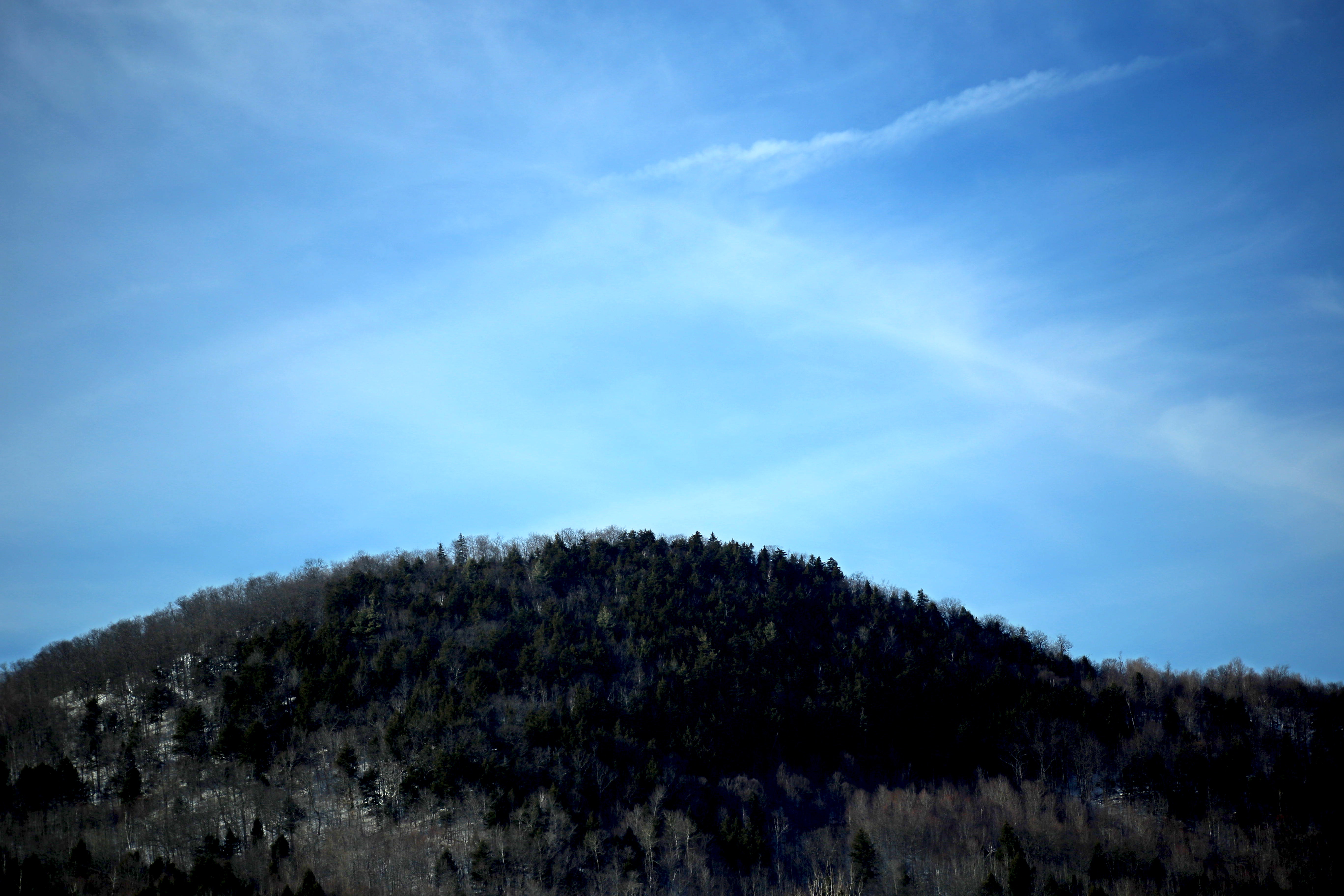 Black mountain during daytime photo