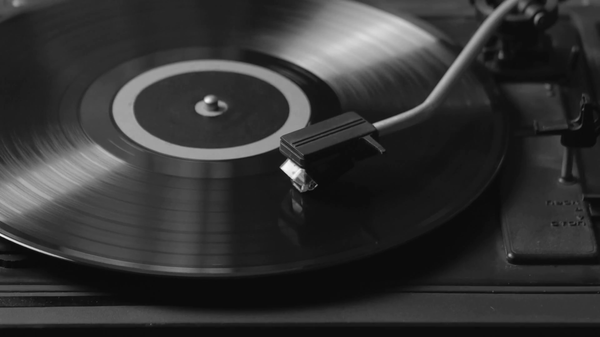 Black and white shot of a record player playing vinyl. Retro Vinyl ...