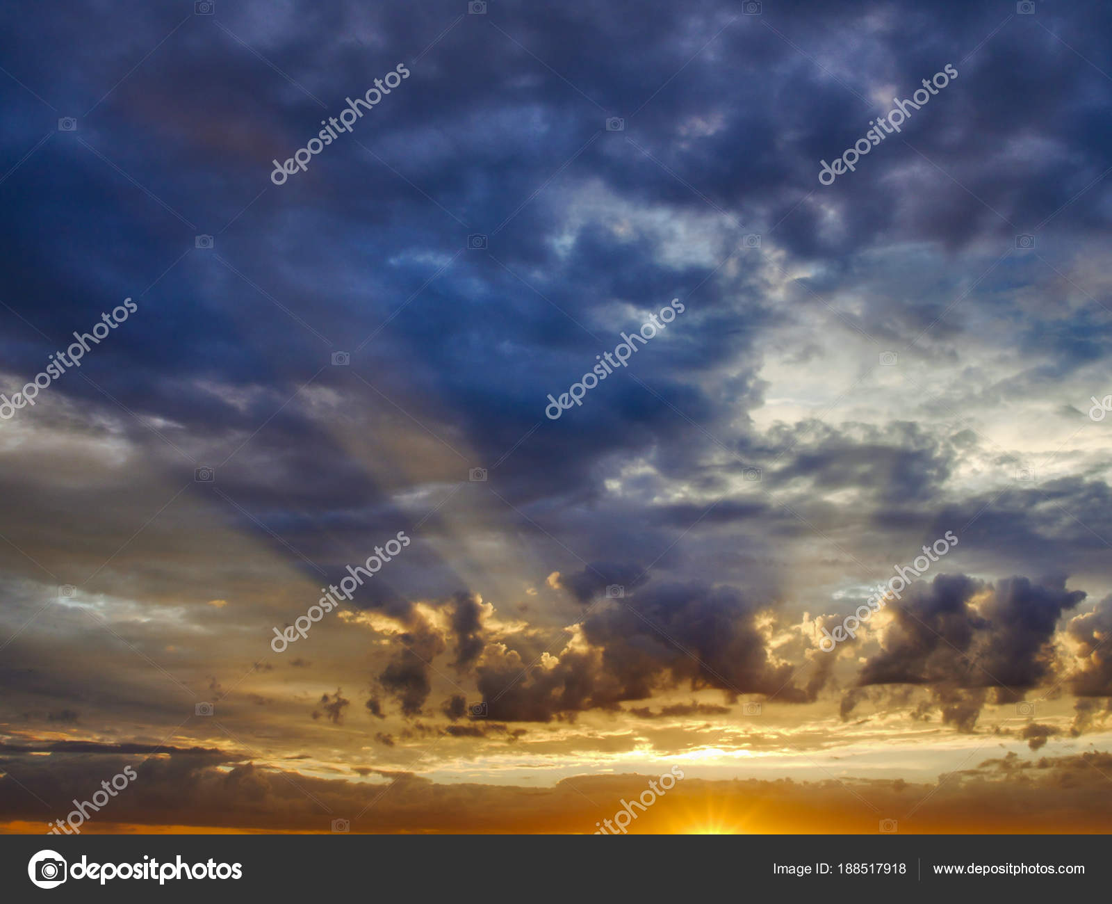 Impressive sky with sun rays seep through clouds during sunrise ...