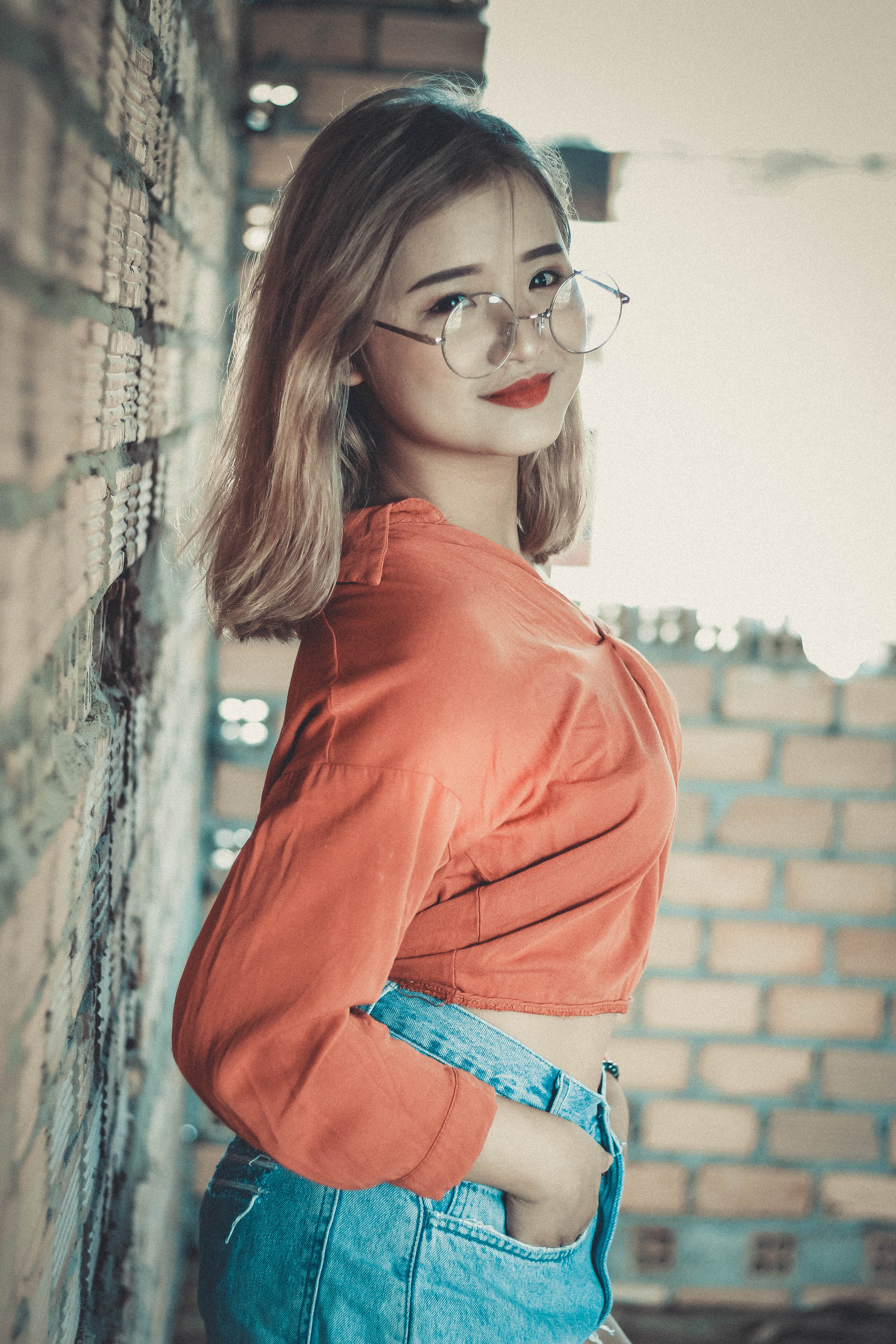 Blonde Haired Woman in Orange Long-sleeved Crop Top Wearing Round Gray Eyeglasses, Lifestyle, Young, Woman, Wear, HQ Photo