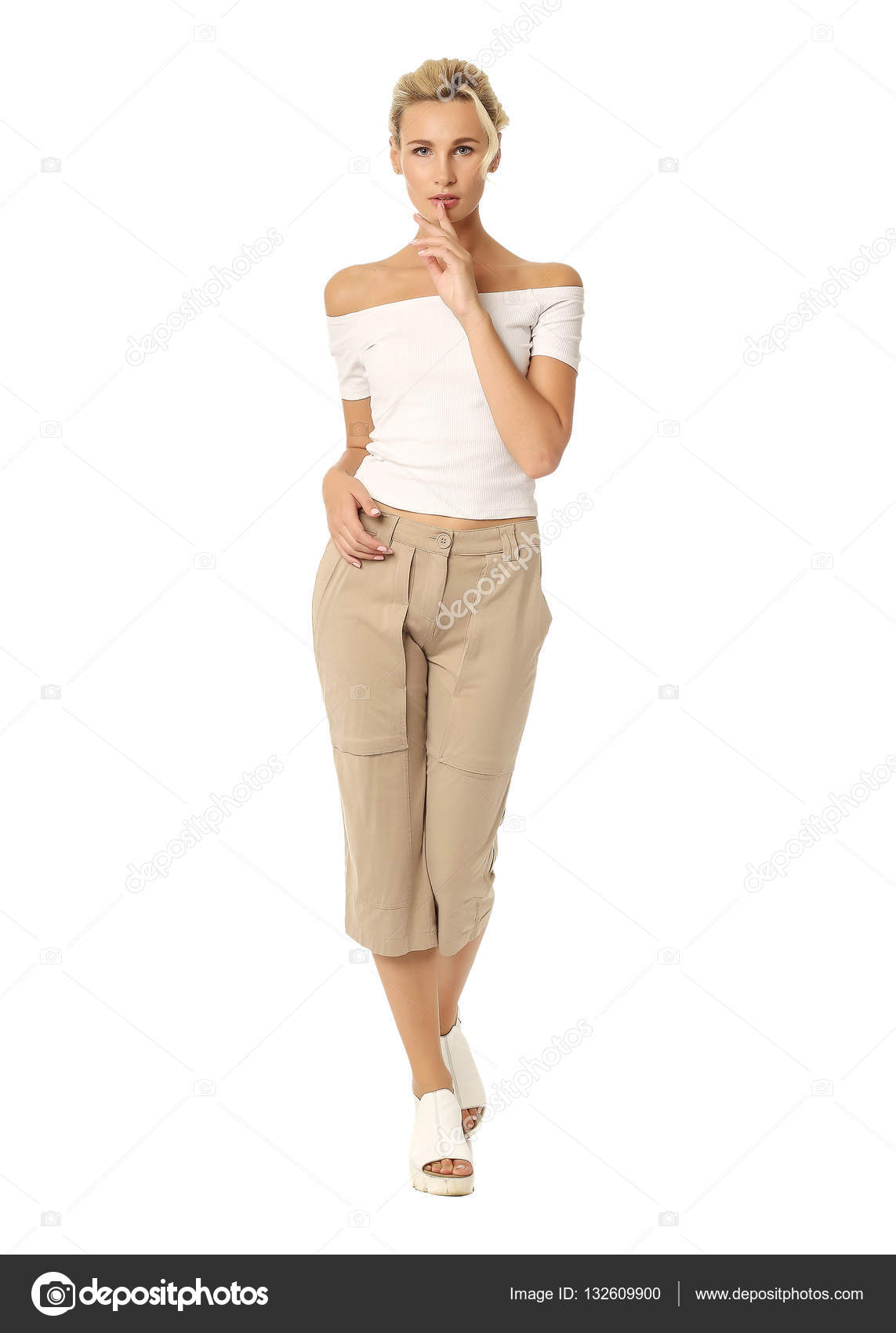 Beautiful sexual model blonde pose in beige breeches — Stock Photo ...
