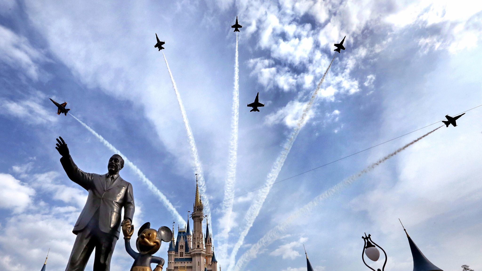 Blue Angels fly over Disney's Magic Kingdom - Orlando Sentinel