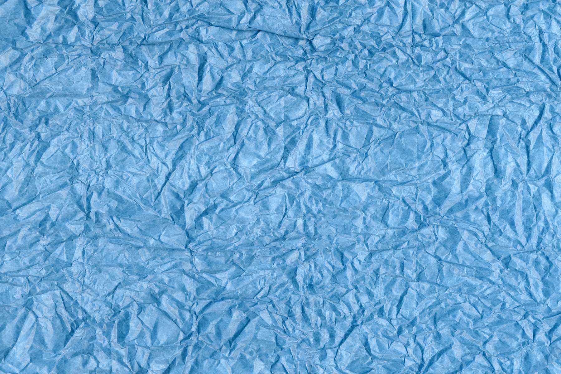 Blue crumpled paper texture photo
