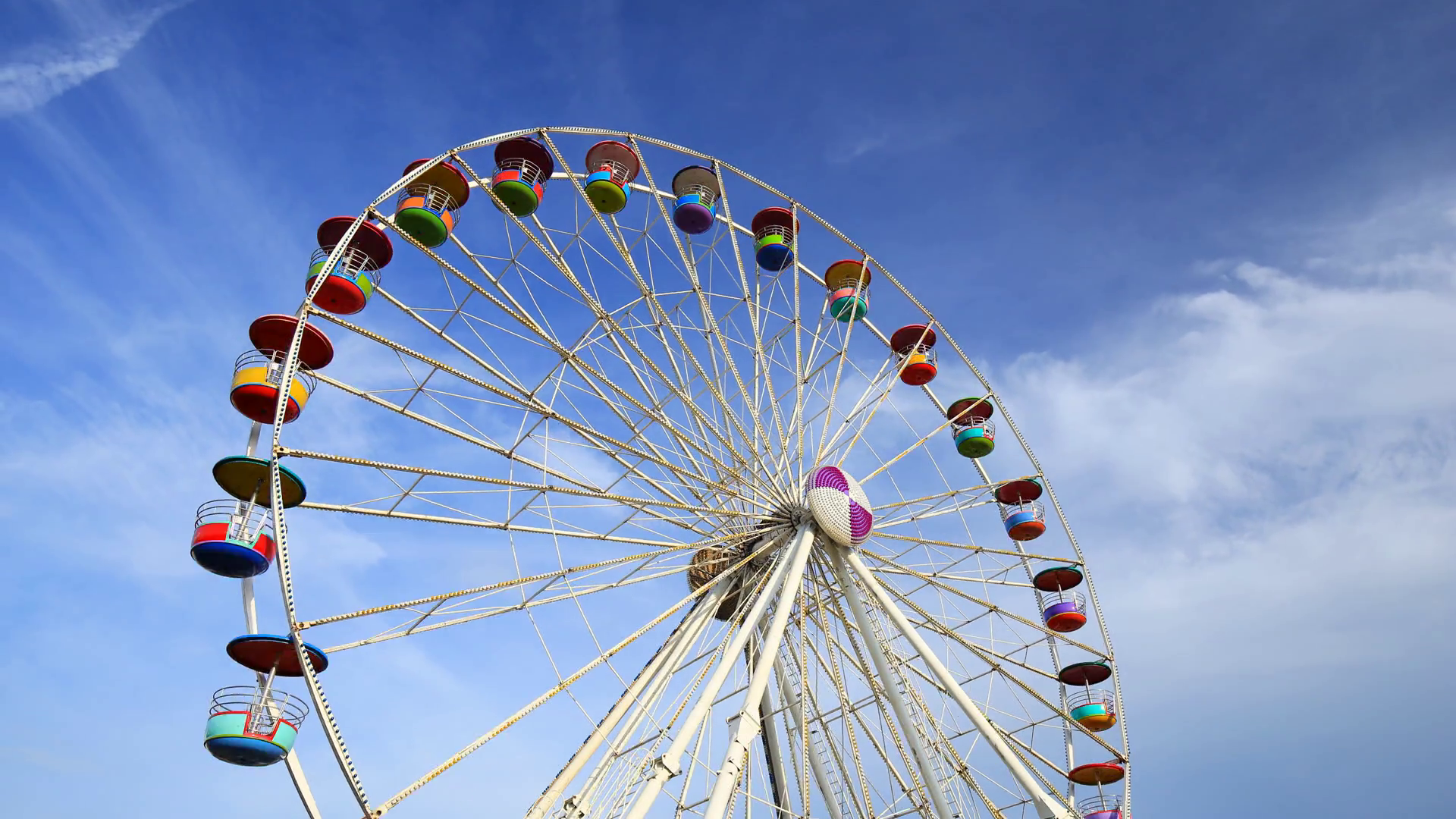 4k Time-lapse of Ferris Wheel at amusement park with blue sky ...