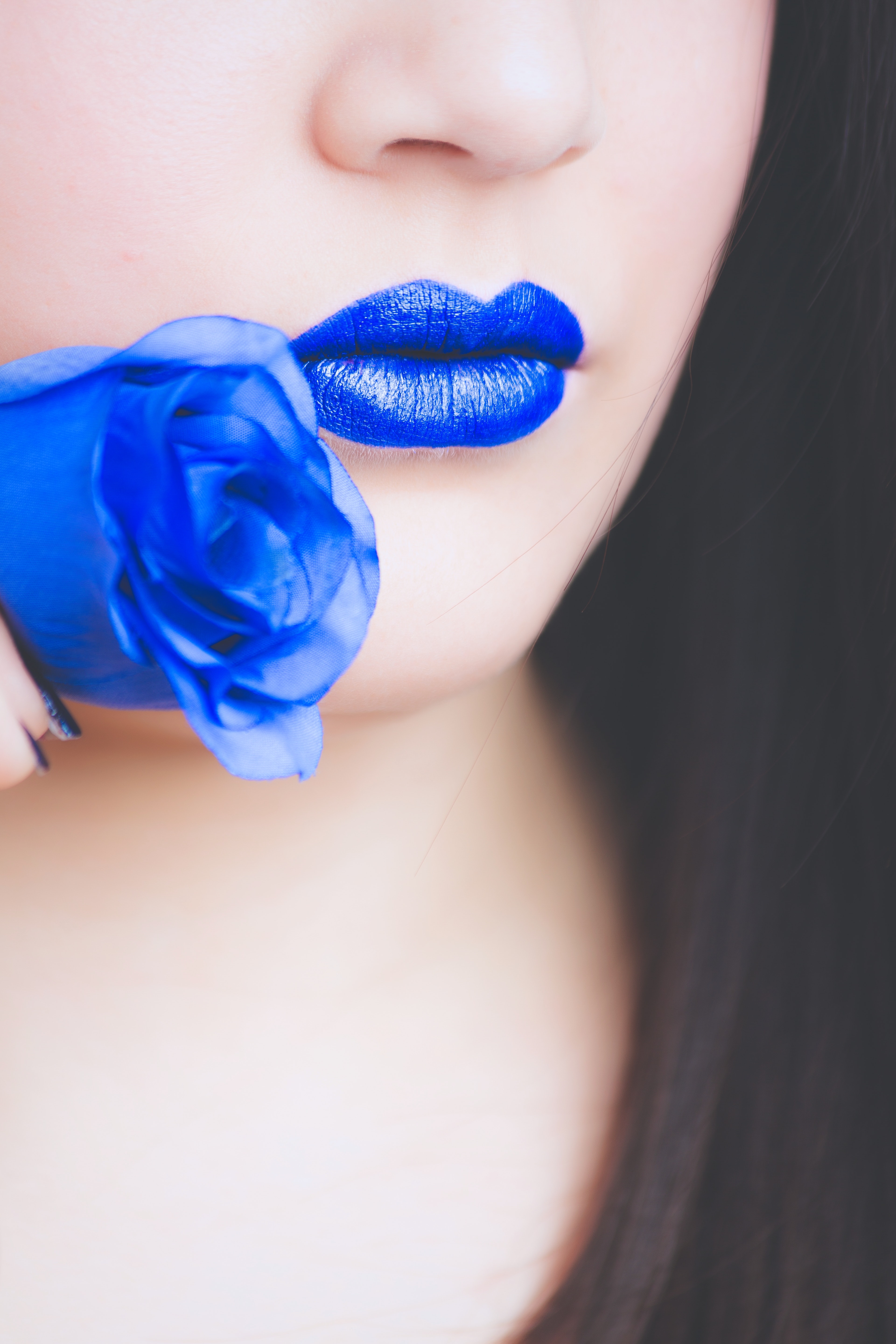 Blue lipstick and blue rose photo