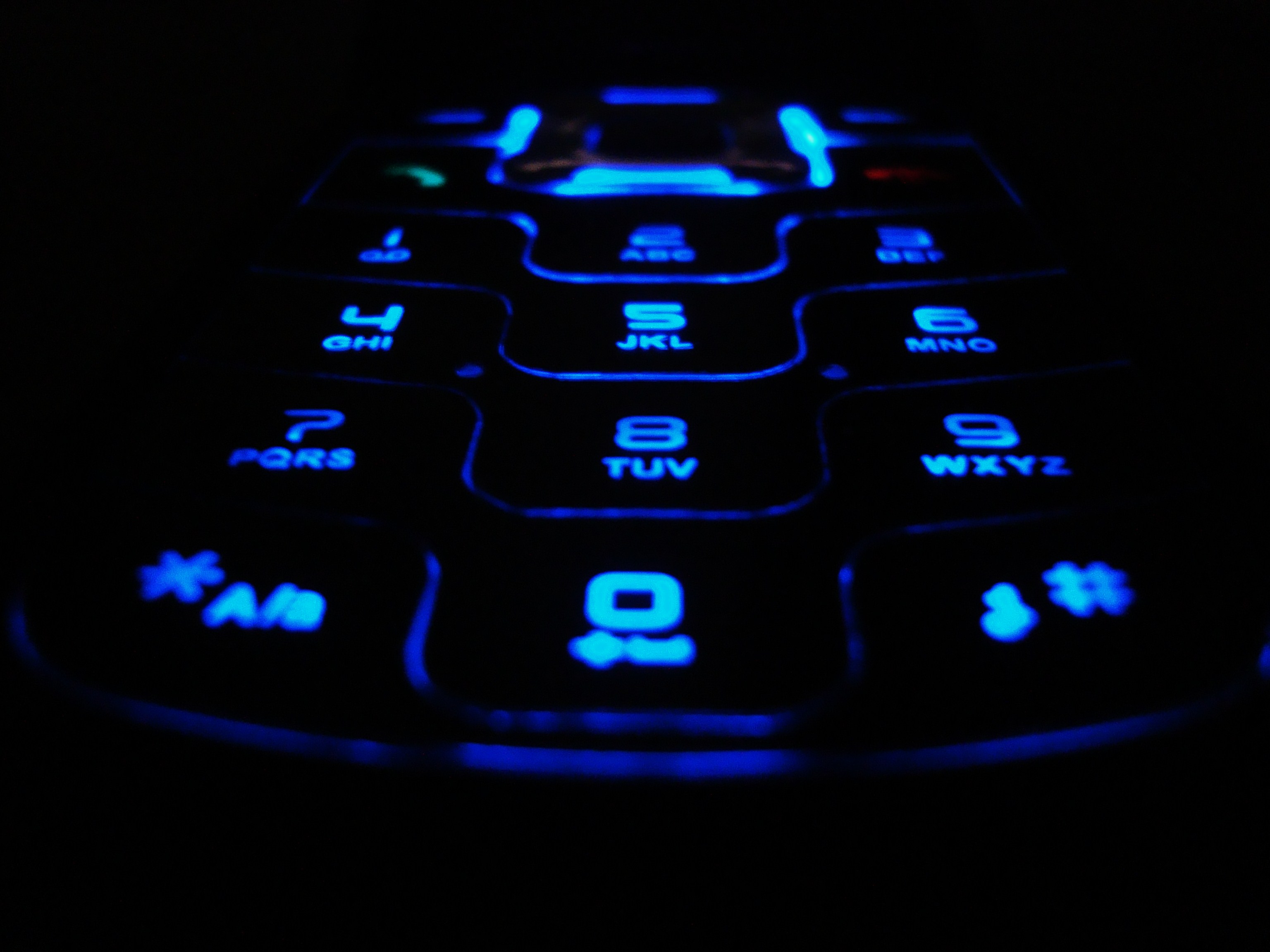 Blue neon mobile phone keypad photo