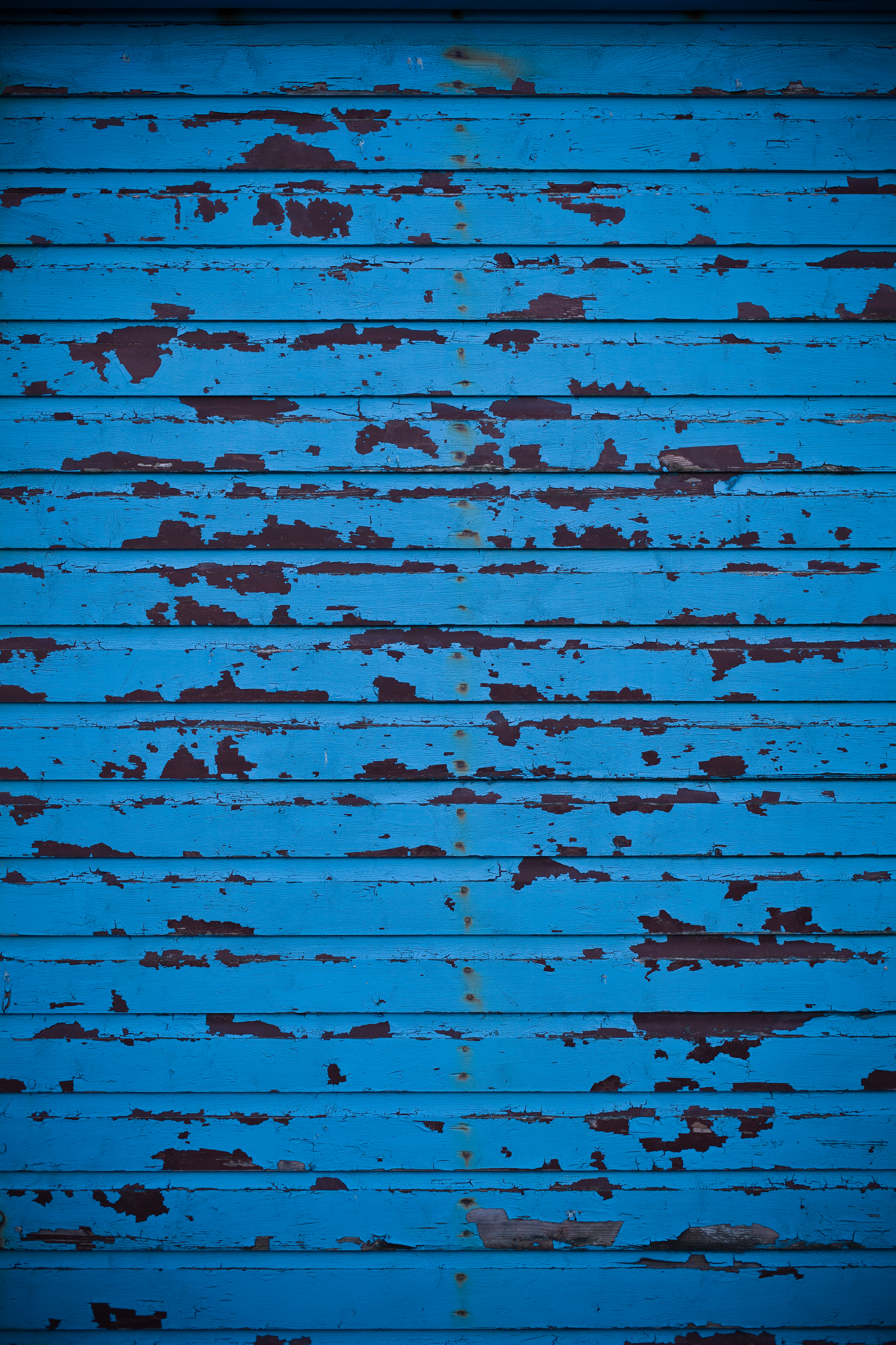 Blue peeled paint wall photo