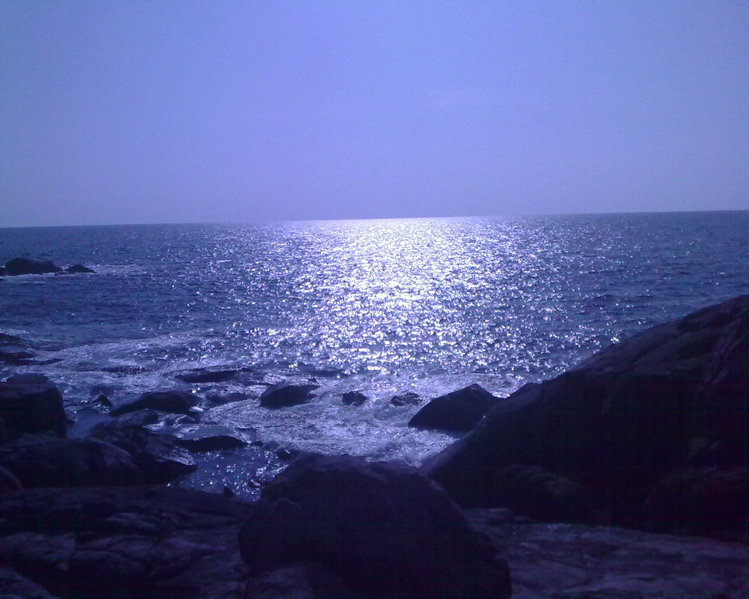 Blue sea with sun light photo