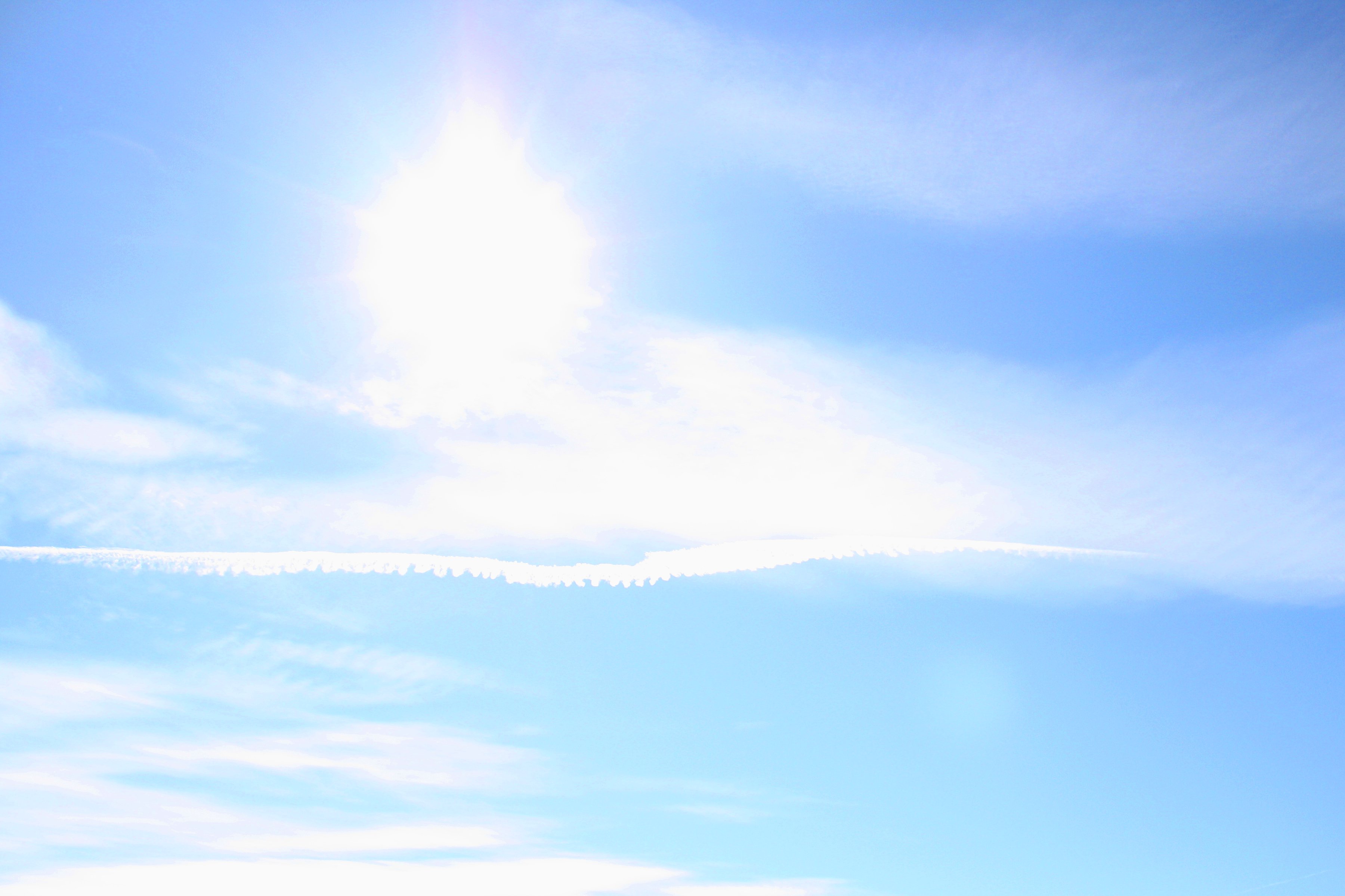 Blue Sky with Sun Clouds and Airplane Trail Picture | Free ...