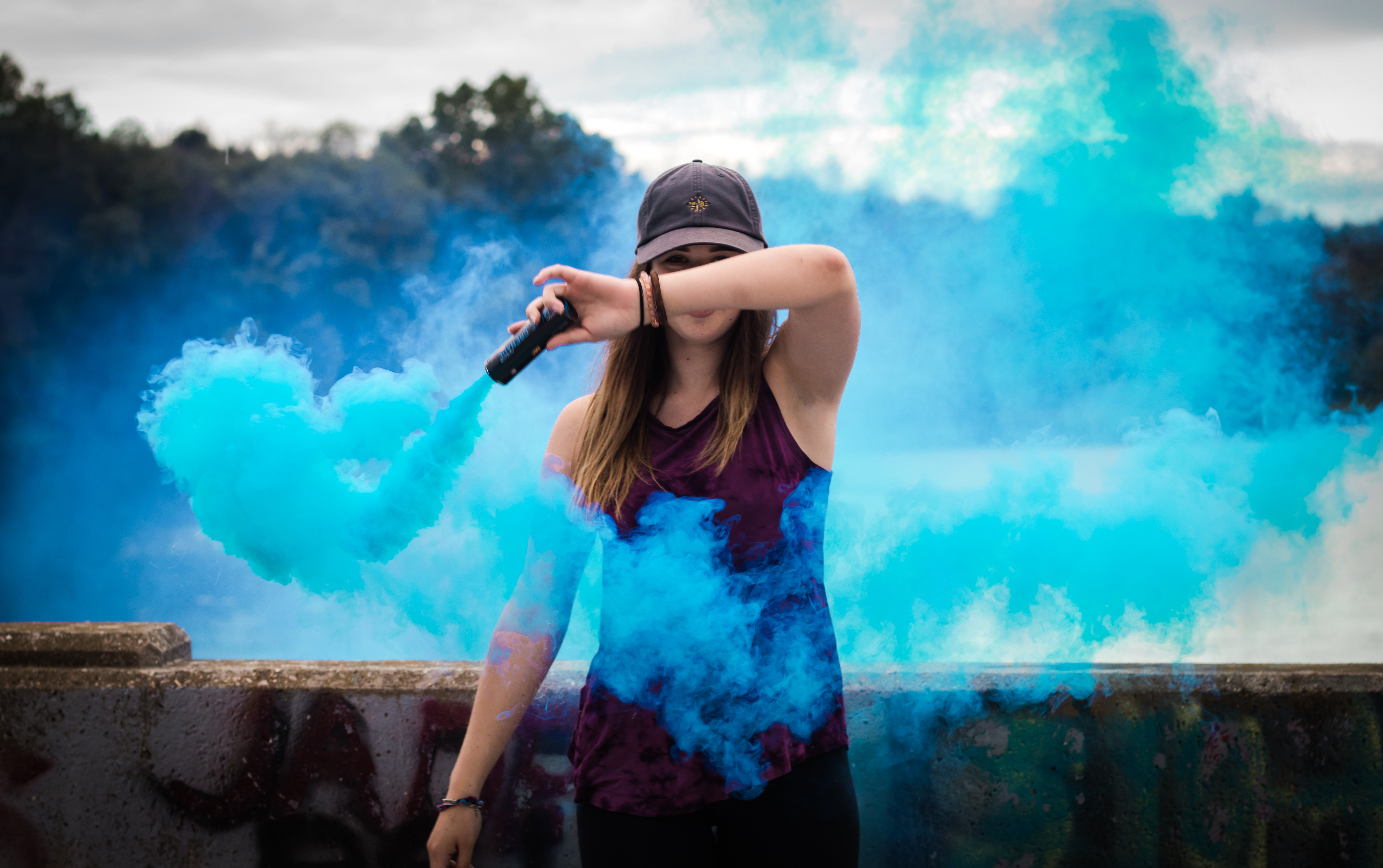 Women wave around blue smoke wand image - Free stock photo - Public ...