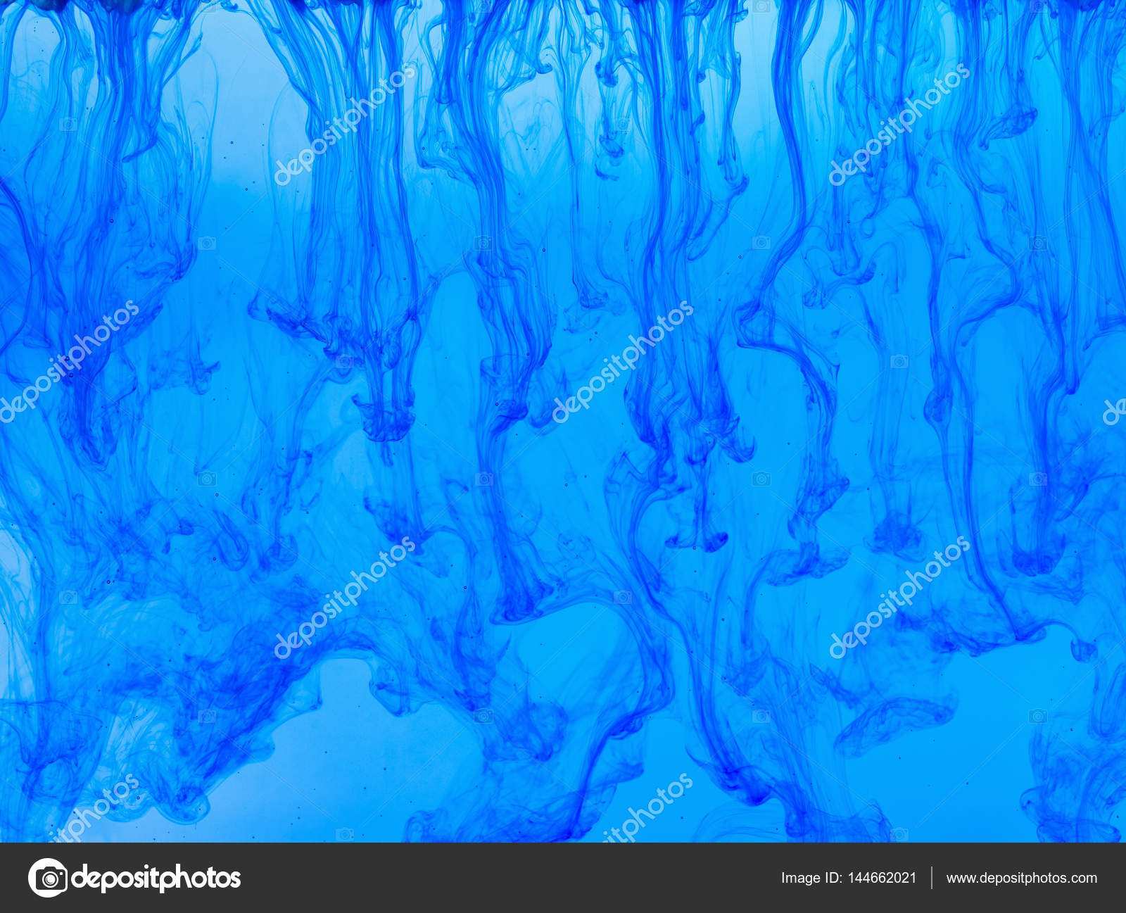 Blue smoke abstract background. Color ink or paint drop in water ...