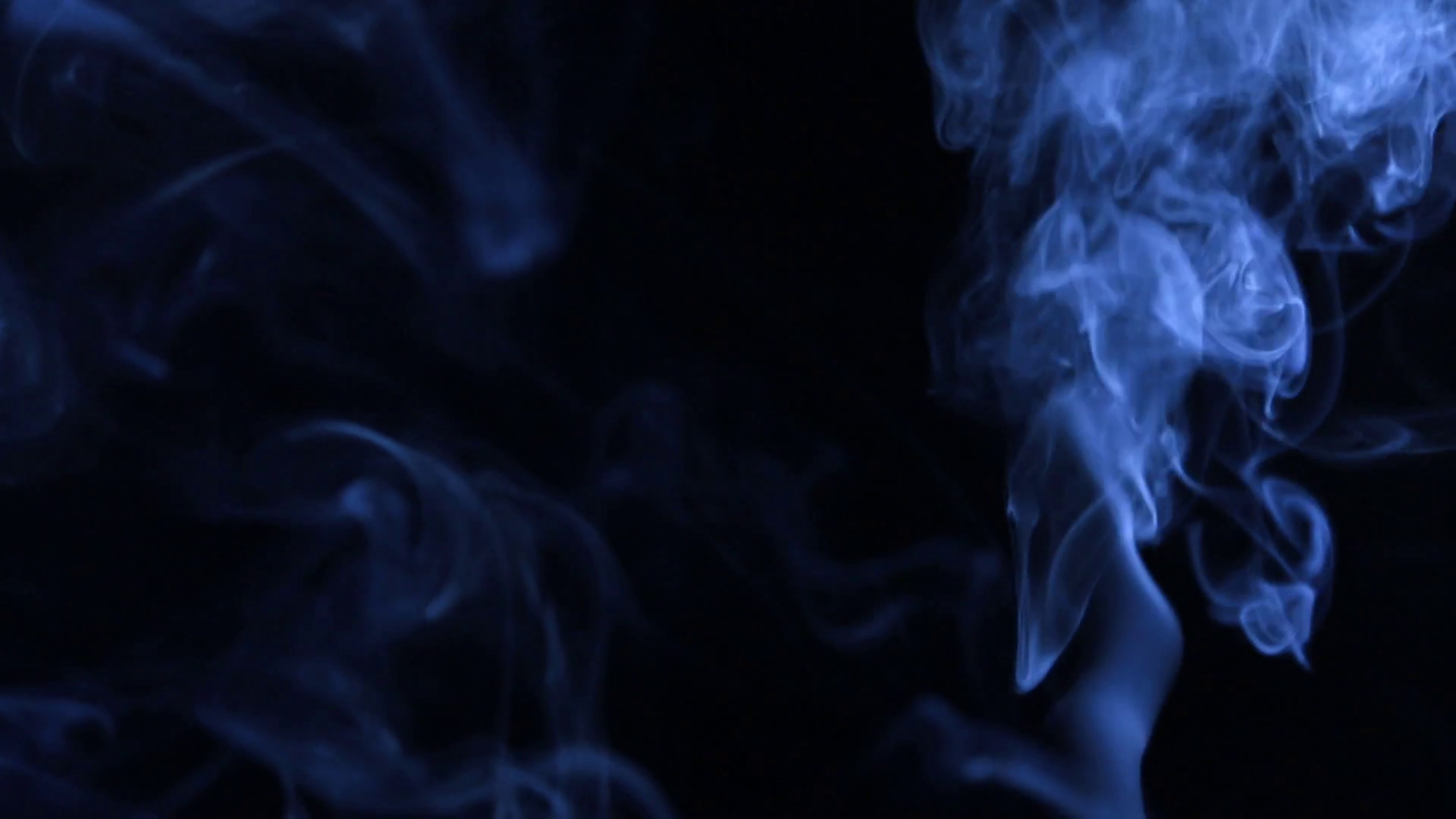 Formless jet of blue smoke for design, on black background. Stock ...