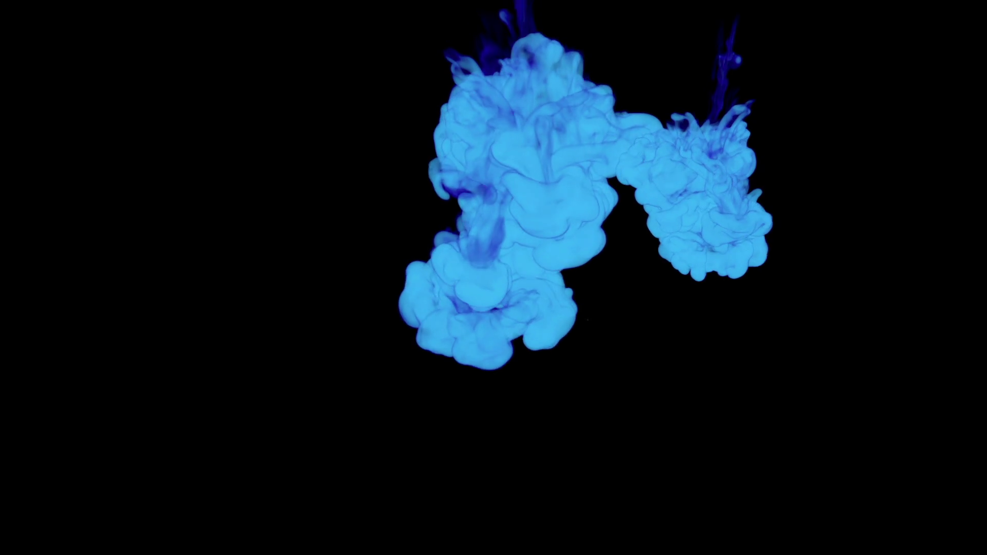 ABSTRACT BACKGROUND. BLUE SMOKE or BLUE INK IN WATER SERIES ON BLACK ...