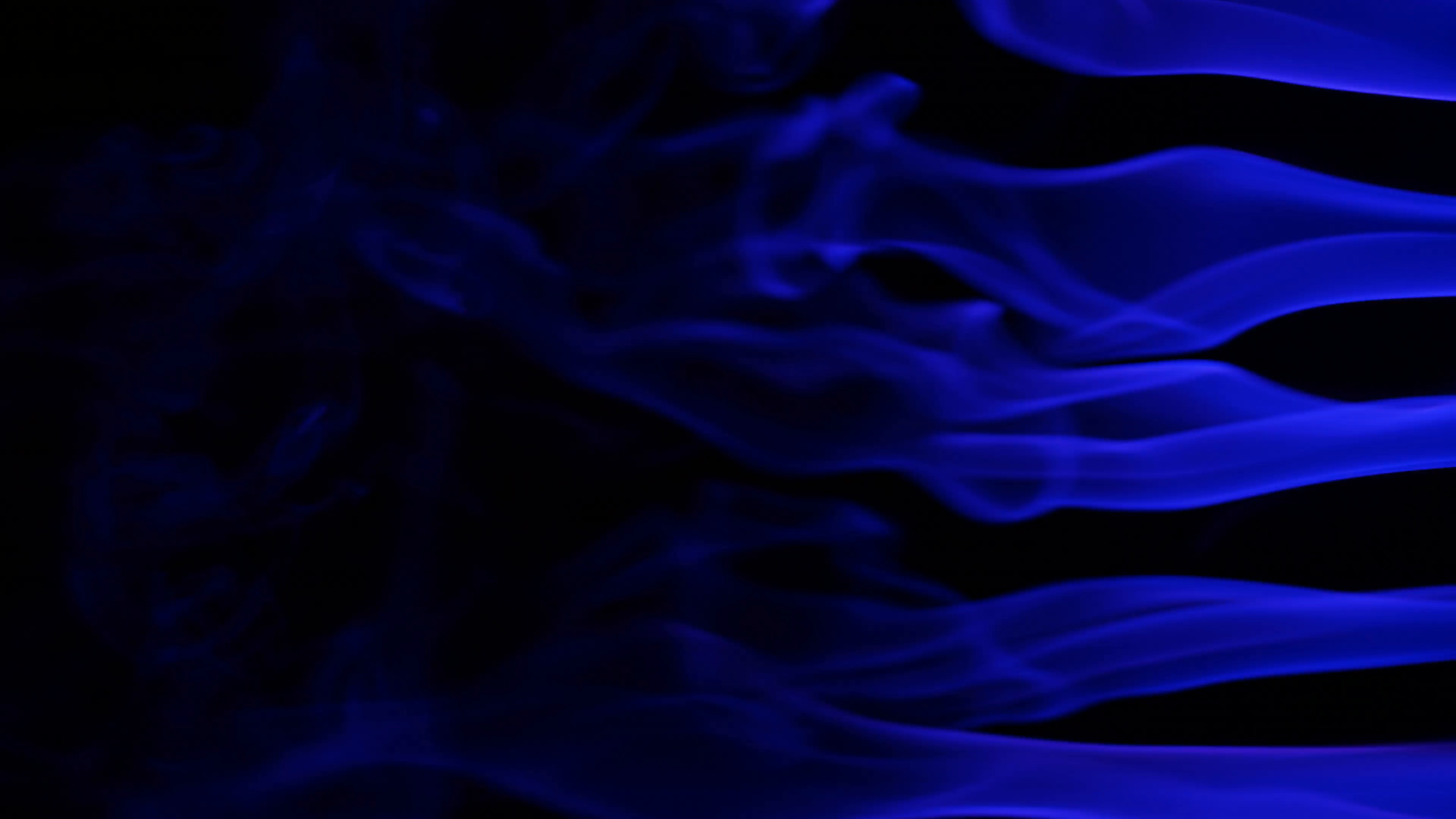 Blue smoke loop - black background Stock Video Footage - Videoblocks