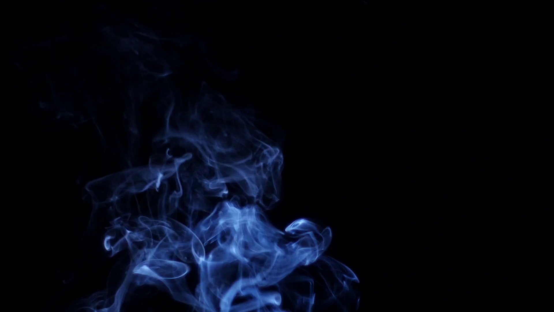 Blue smoke on black background Stock Video Footage - Videoblocks