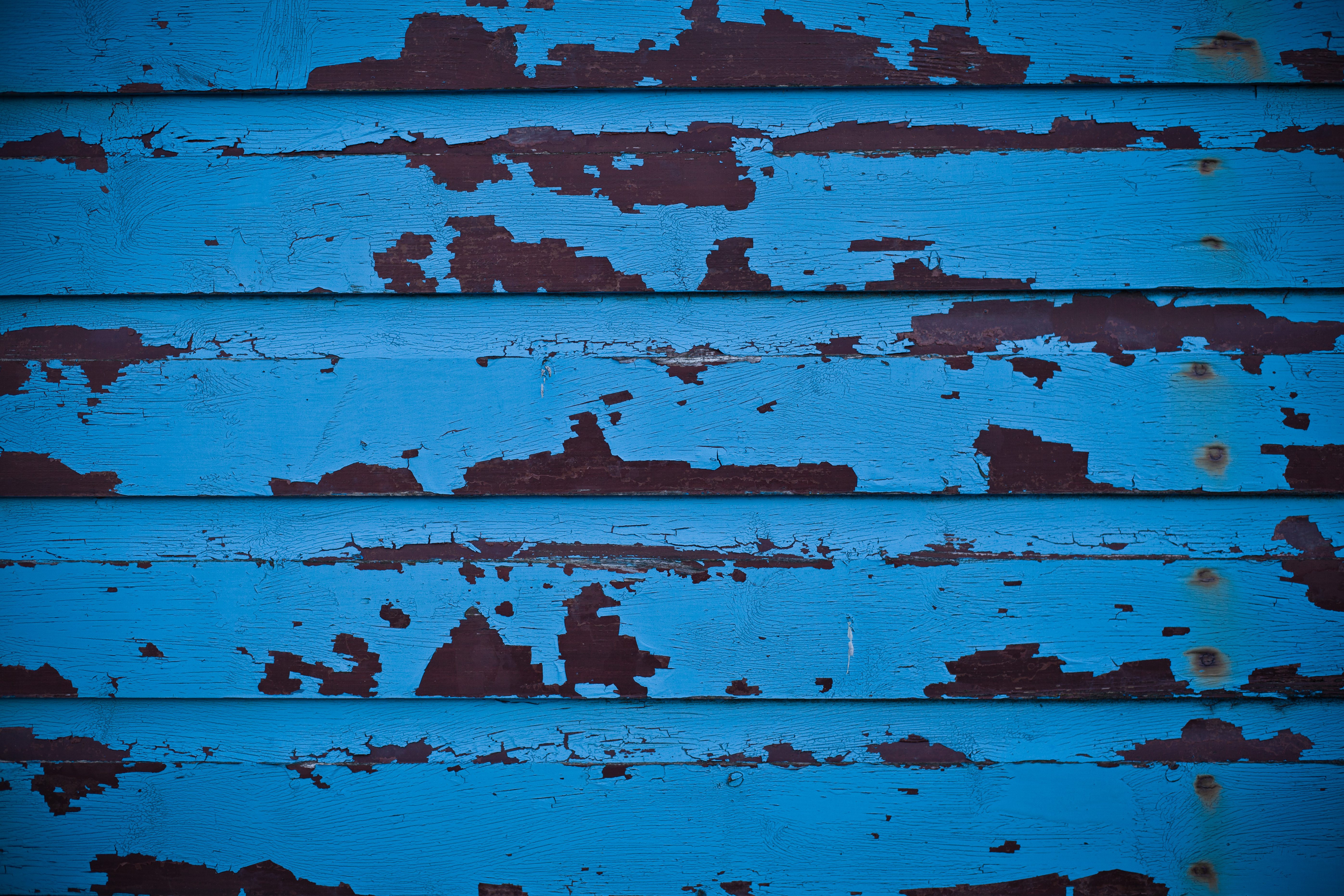 Blue wooden peeled paint wall photo
