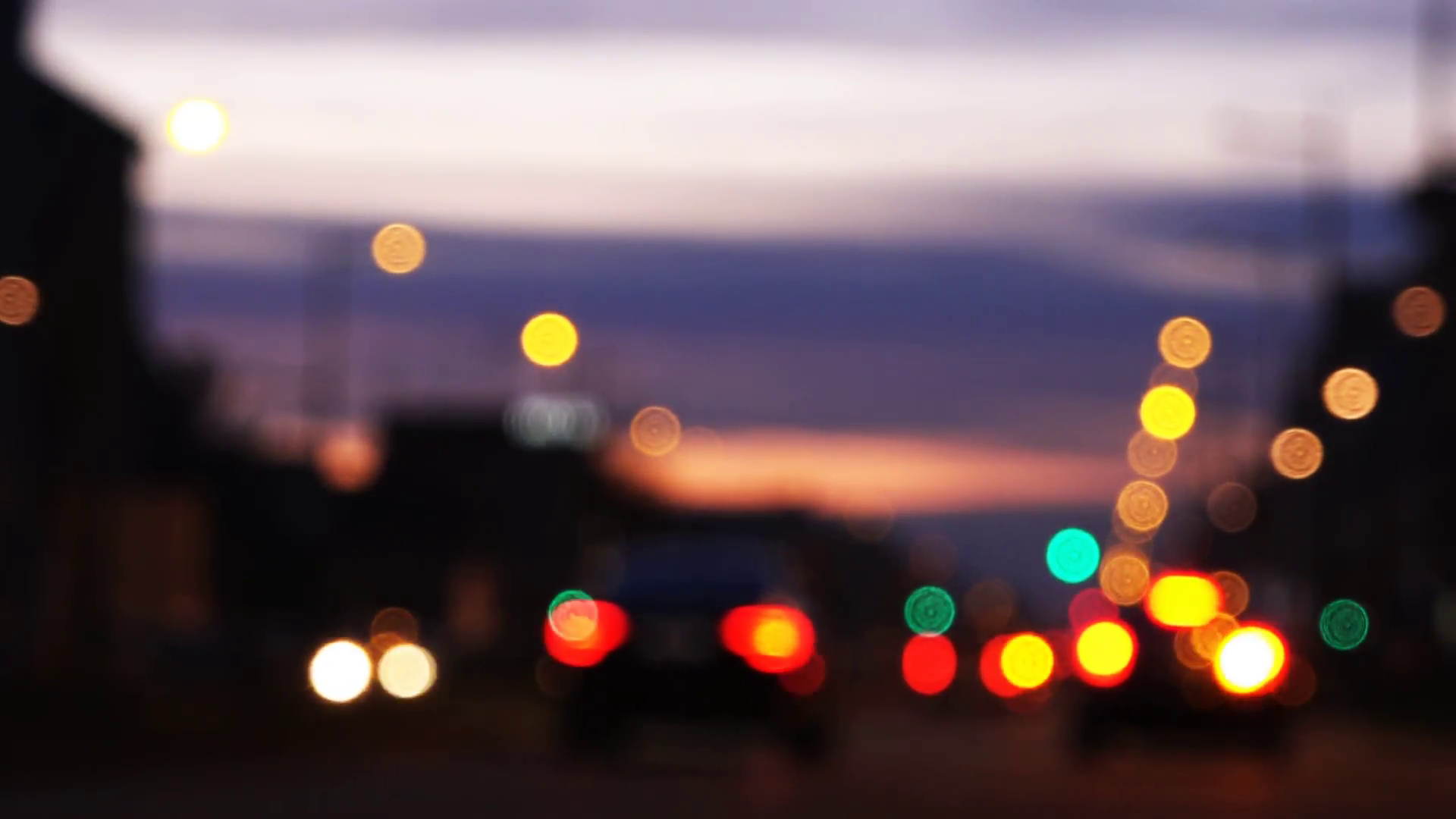 Blur city traffic light bokeh, cars driving on city streets in the ...
