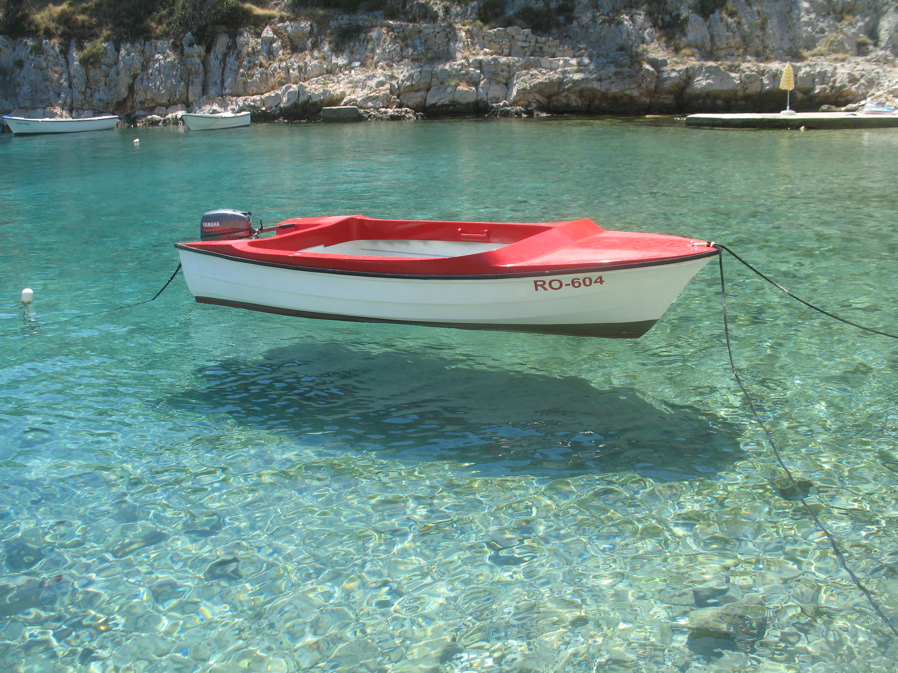 File:Boat on clear water at island Šolta.jpg - Wikimedia Commons