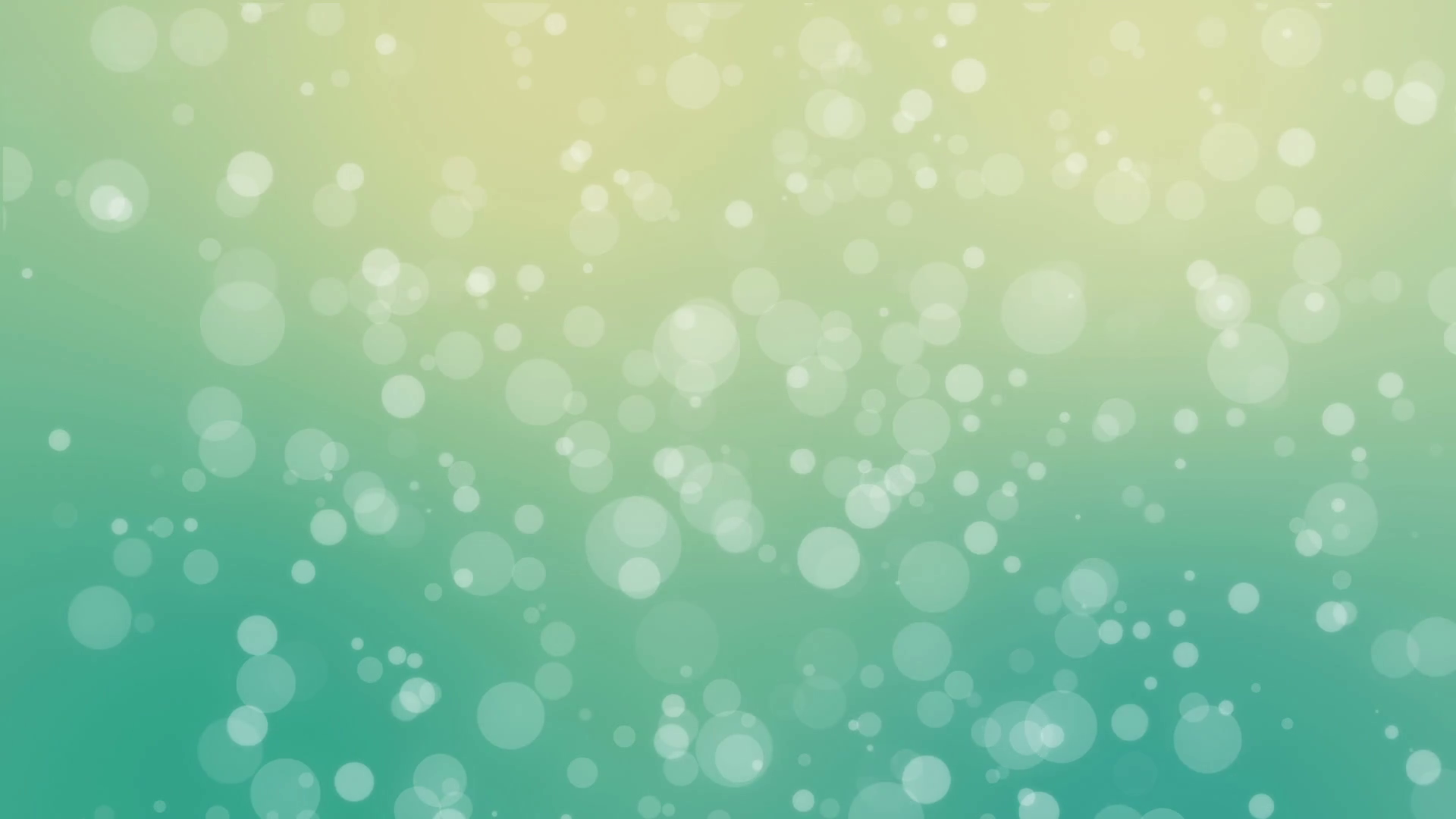 Bokeh holiday background with flickering bubbles against a gradient ...