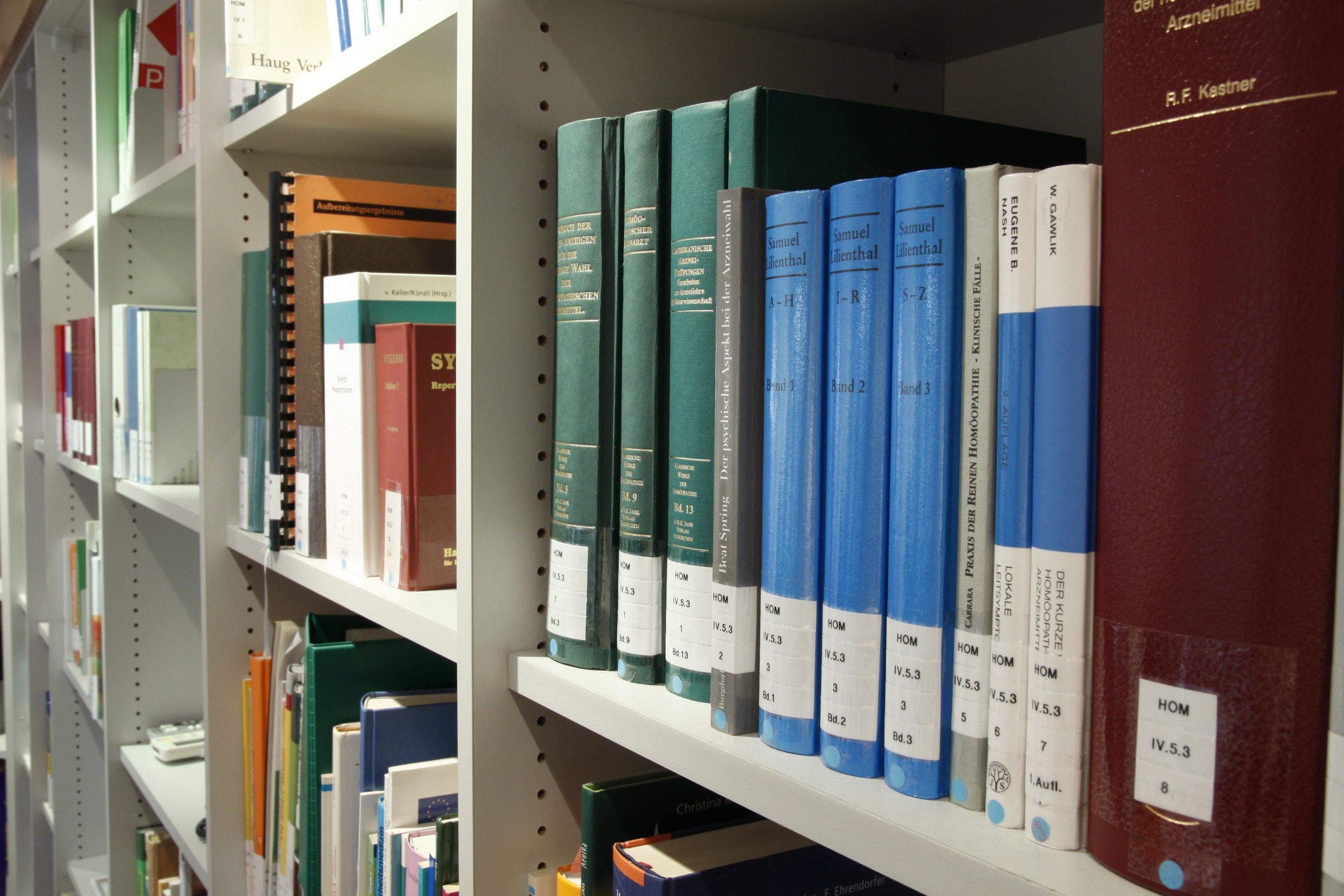 Books on shelf in library photo