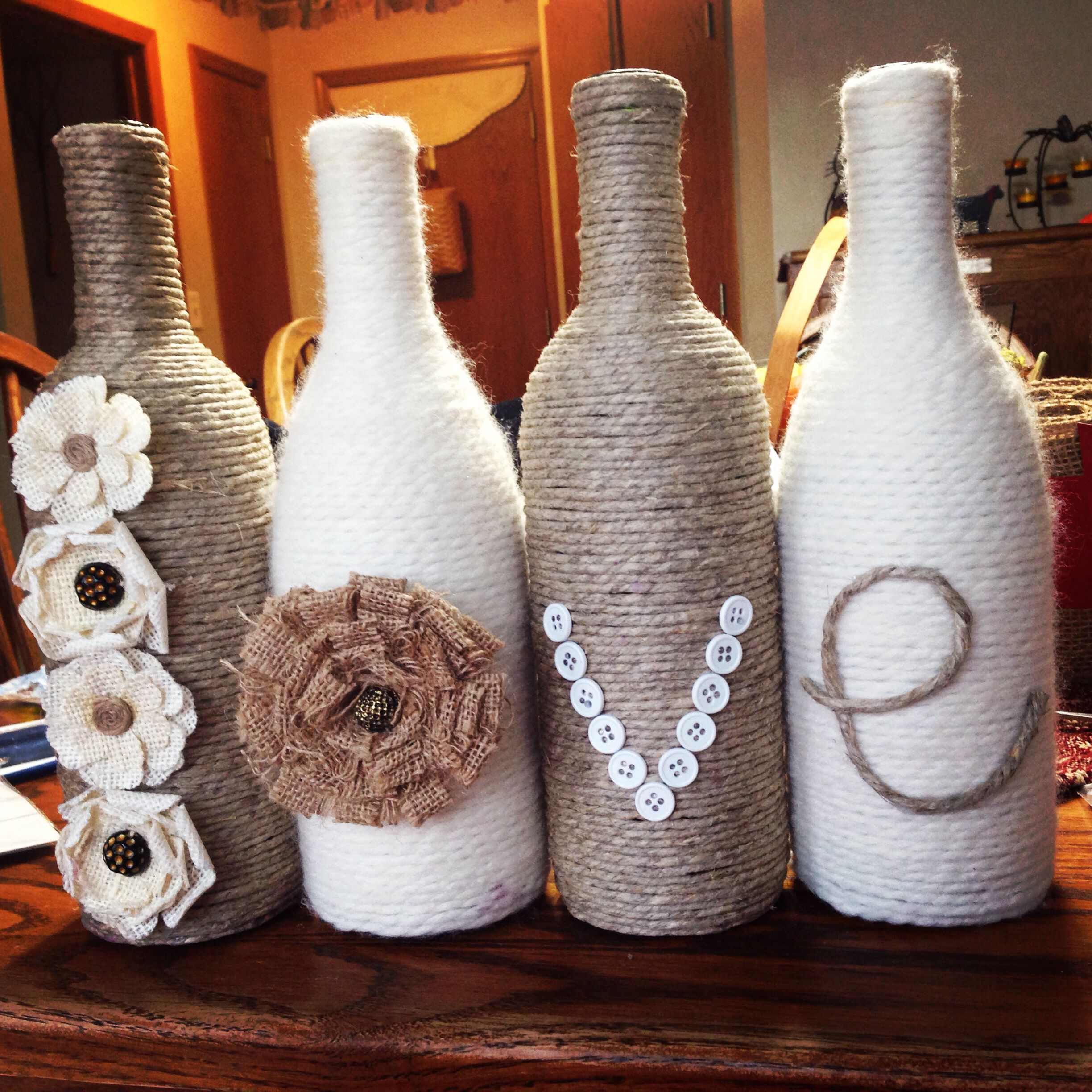 Love' wine bottle set. Twine and yarn wrapped wine bottles for a ...
