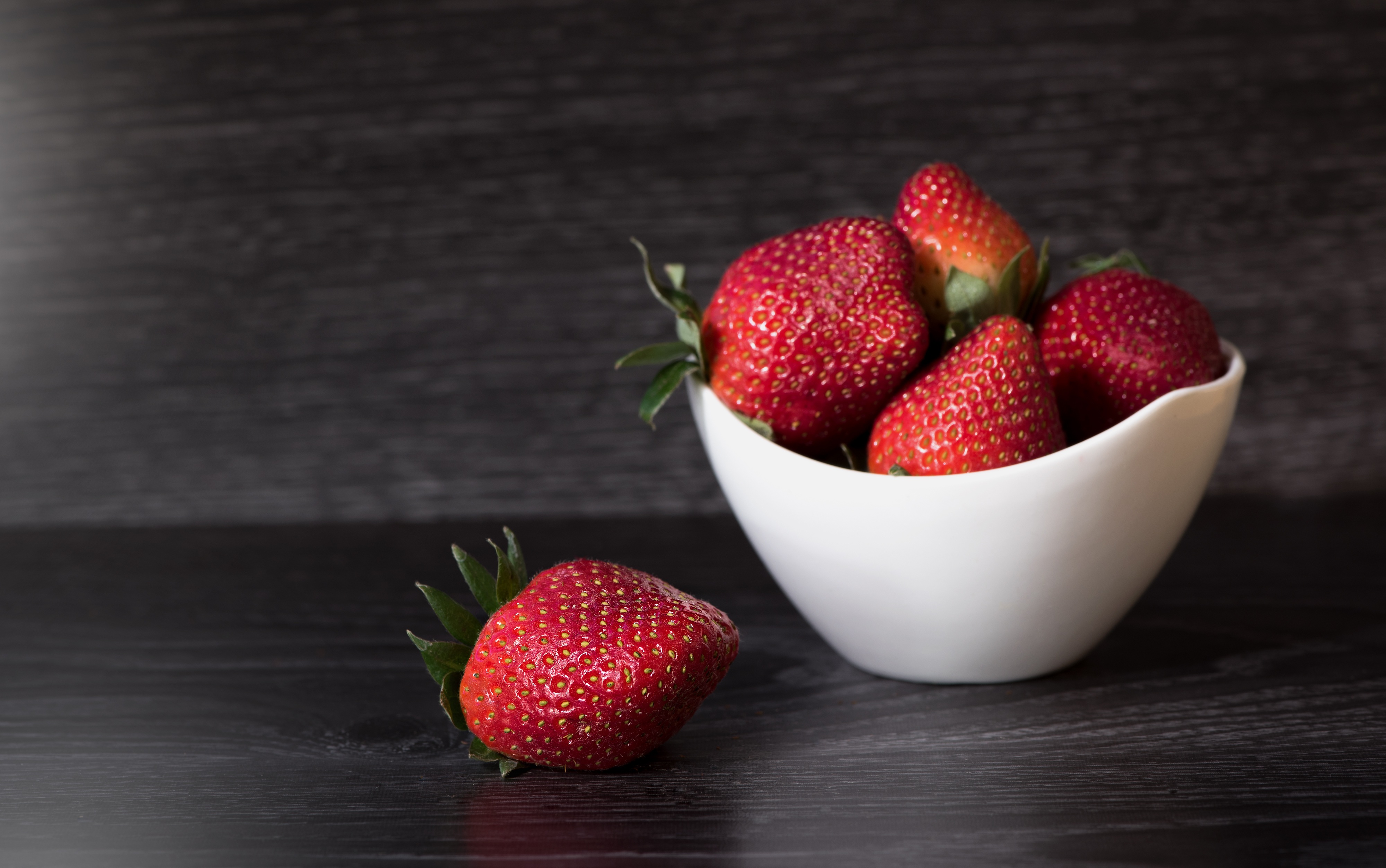 Bowl of strawberries photo