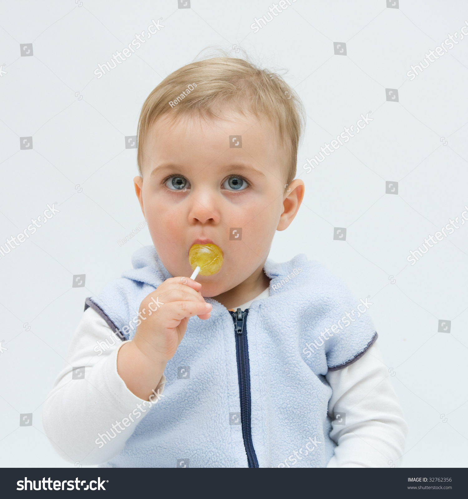 Cute Little Boy Eating Lollipop Stock Photo (Royalty Free) 32762356 ...