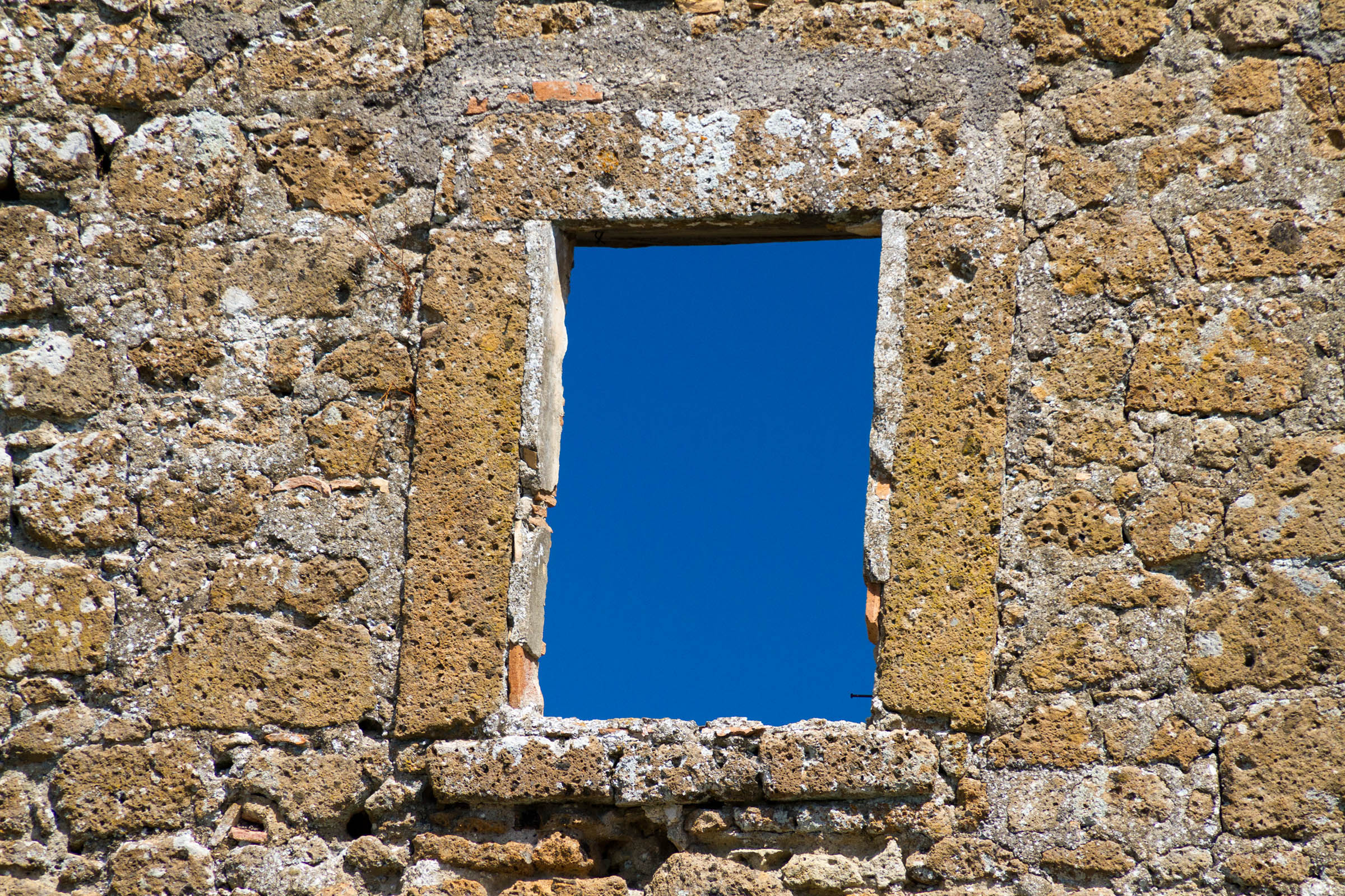 Brick wall with window photo