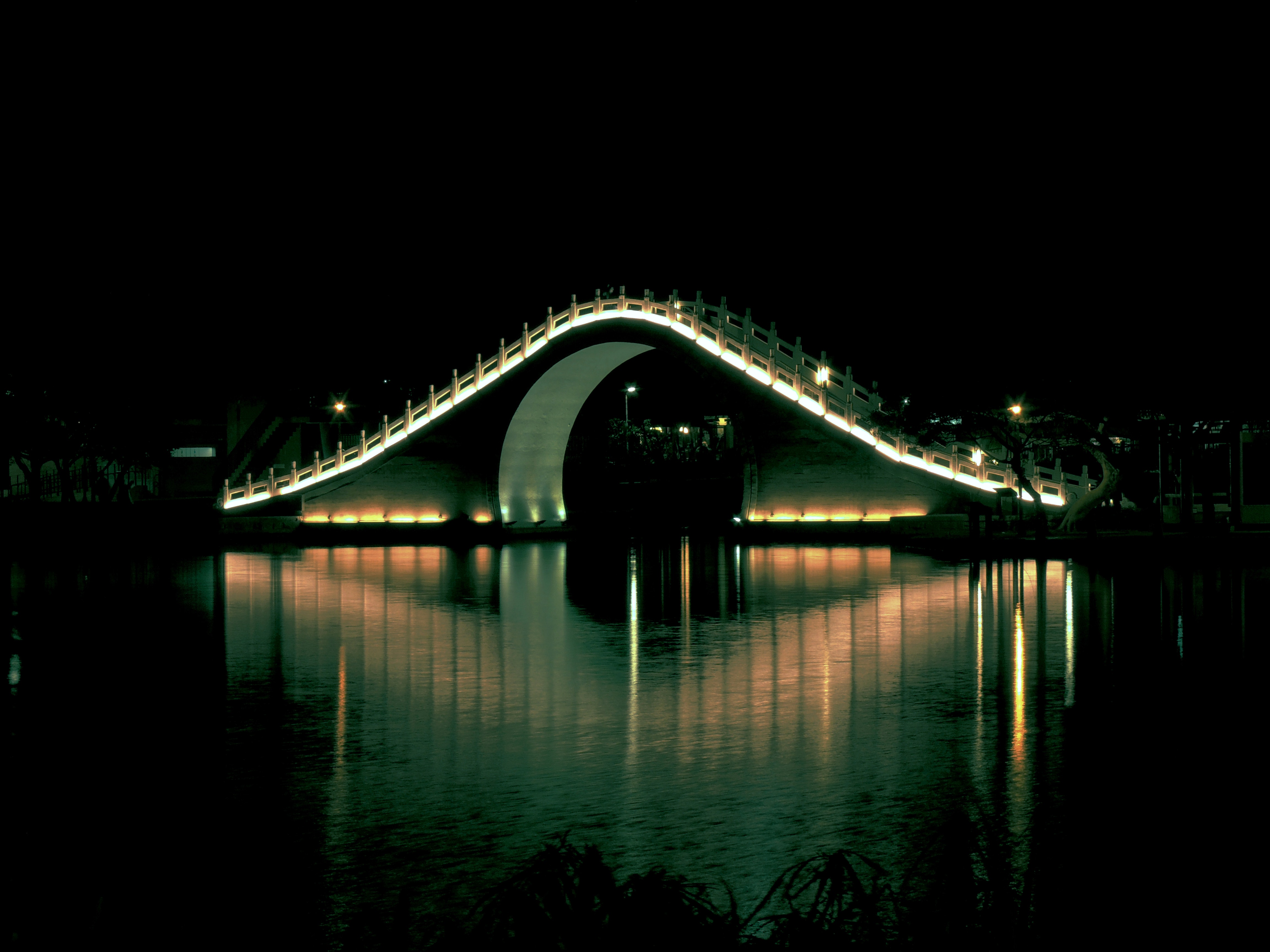 Bridge with lights during nightime photo