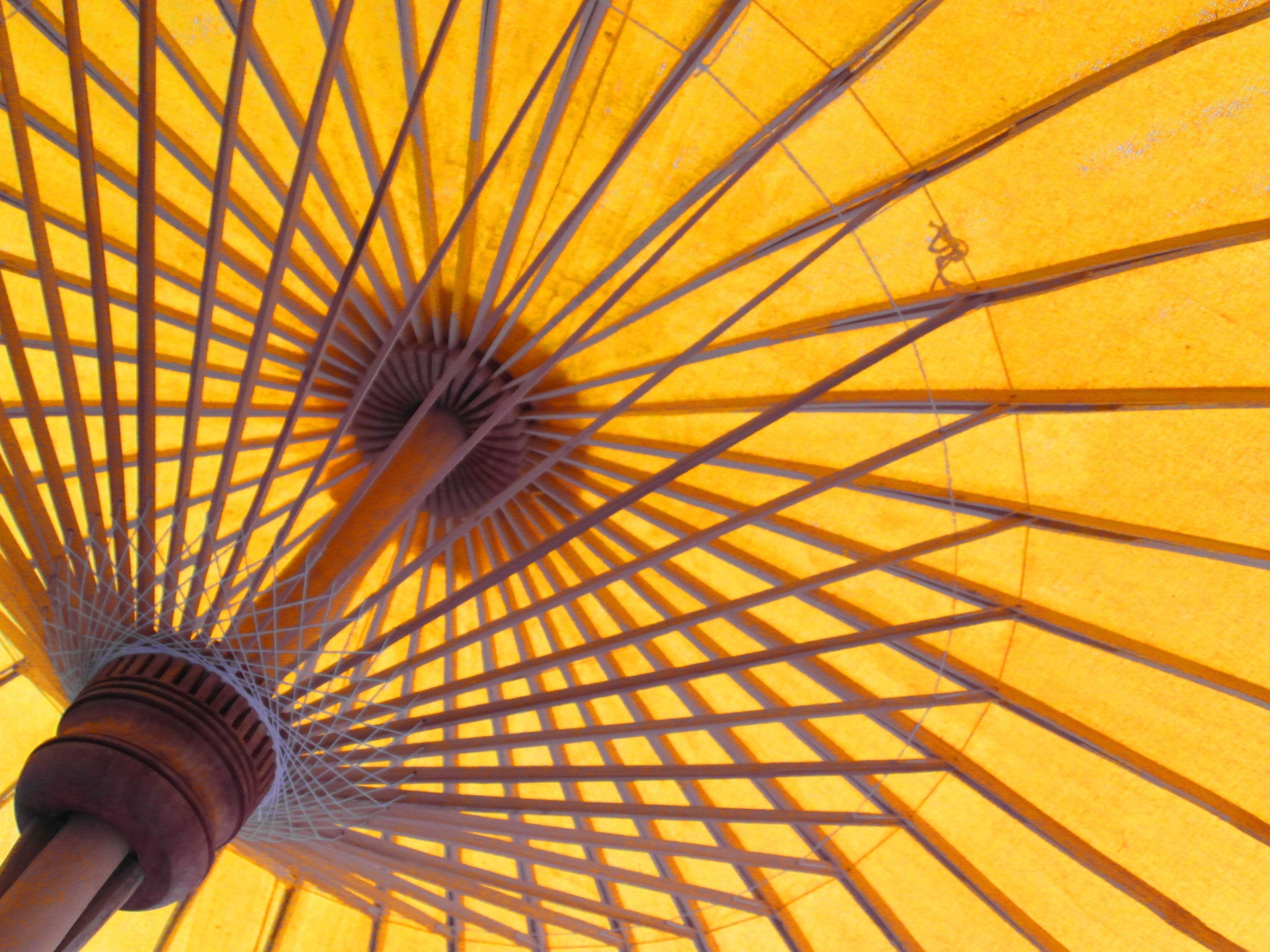 Bright orange oriental sun umbrella photo