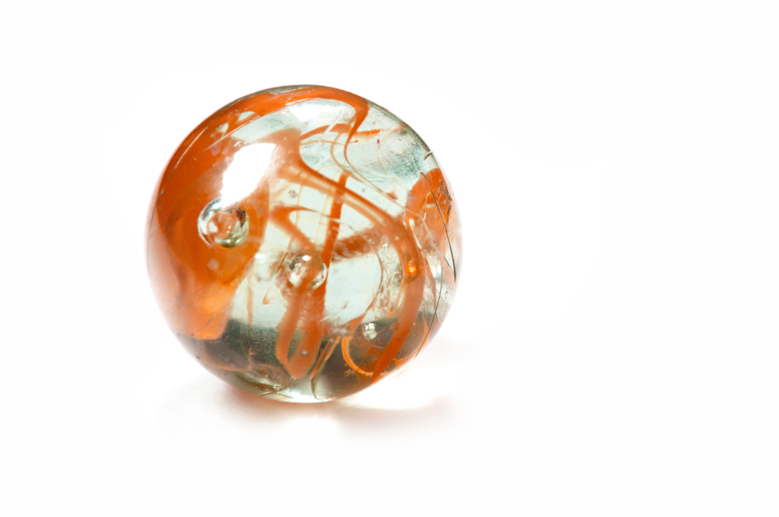 Brightly coloured glass marble photo