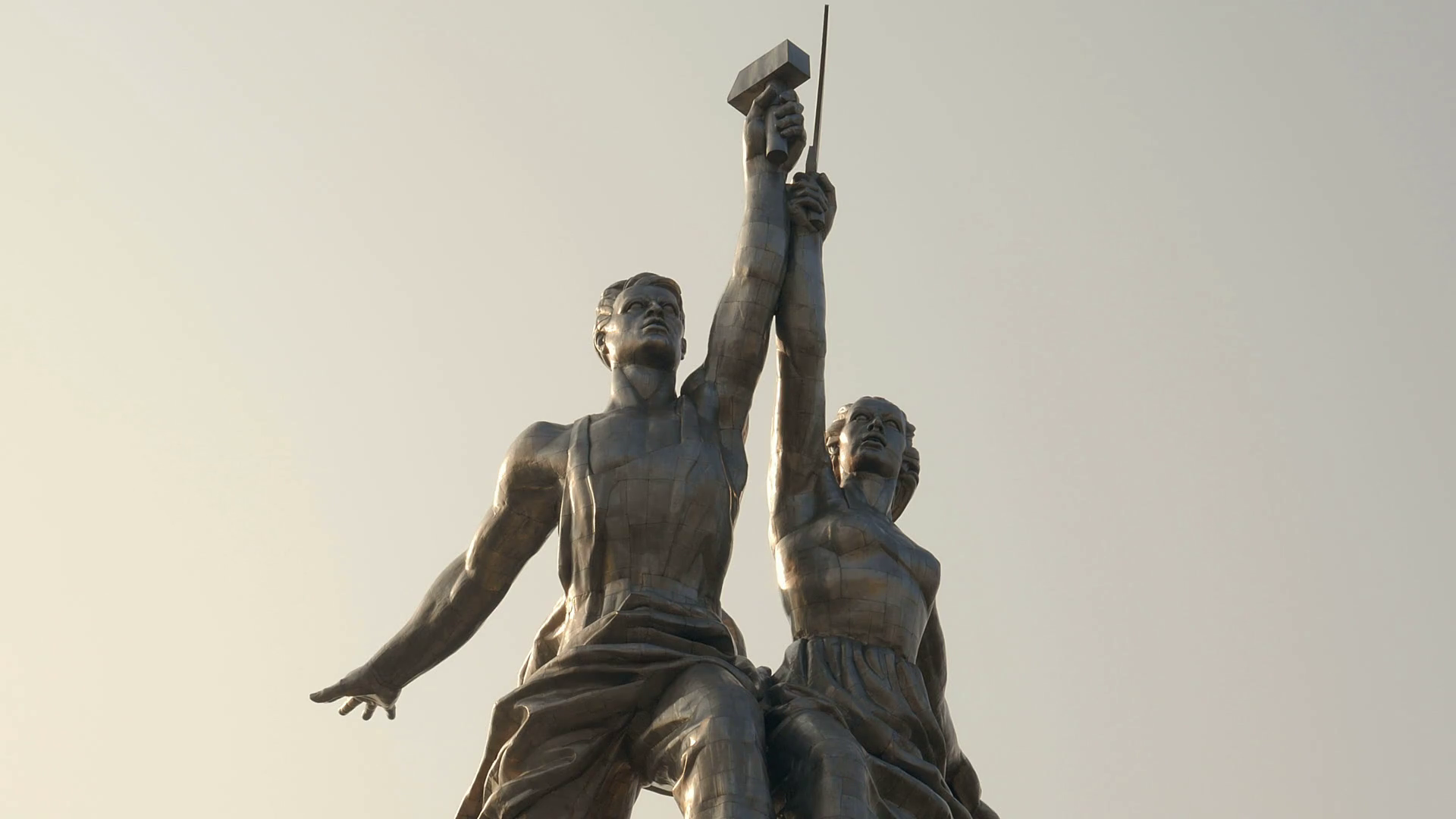 close up of monument Worker and Kolkhoz Woman on background of sky ...