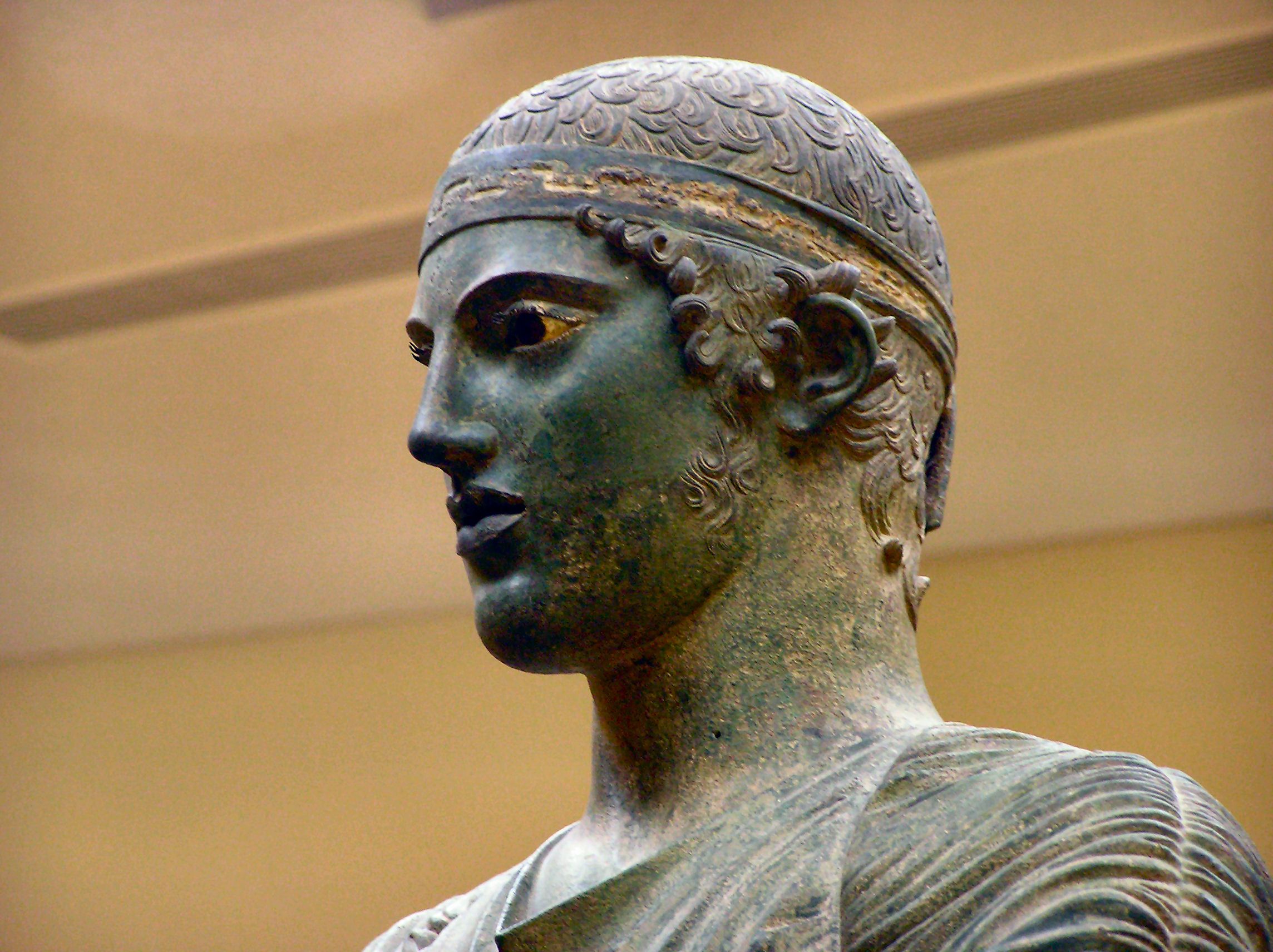 Charioteer of Delphi, close up head detail. | GREEK ART IN BRONZE ...