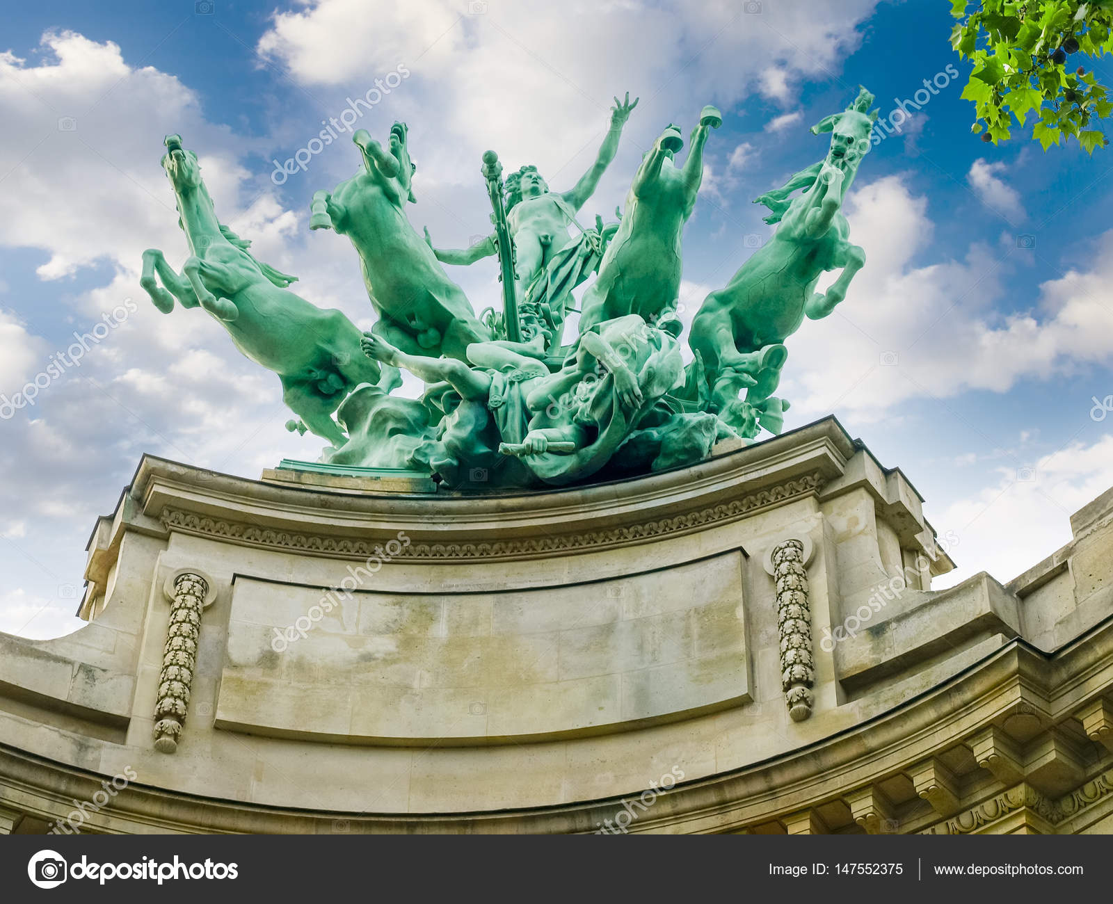 Allegorical statue over facade of Great Palace closeup in Paris ...