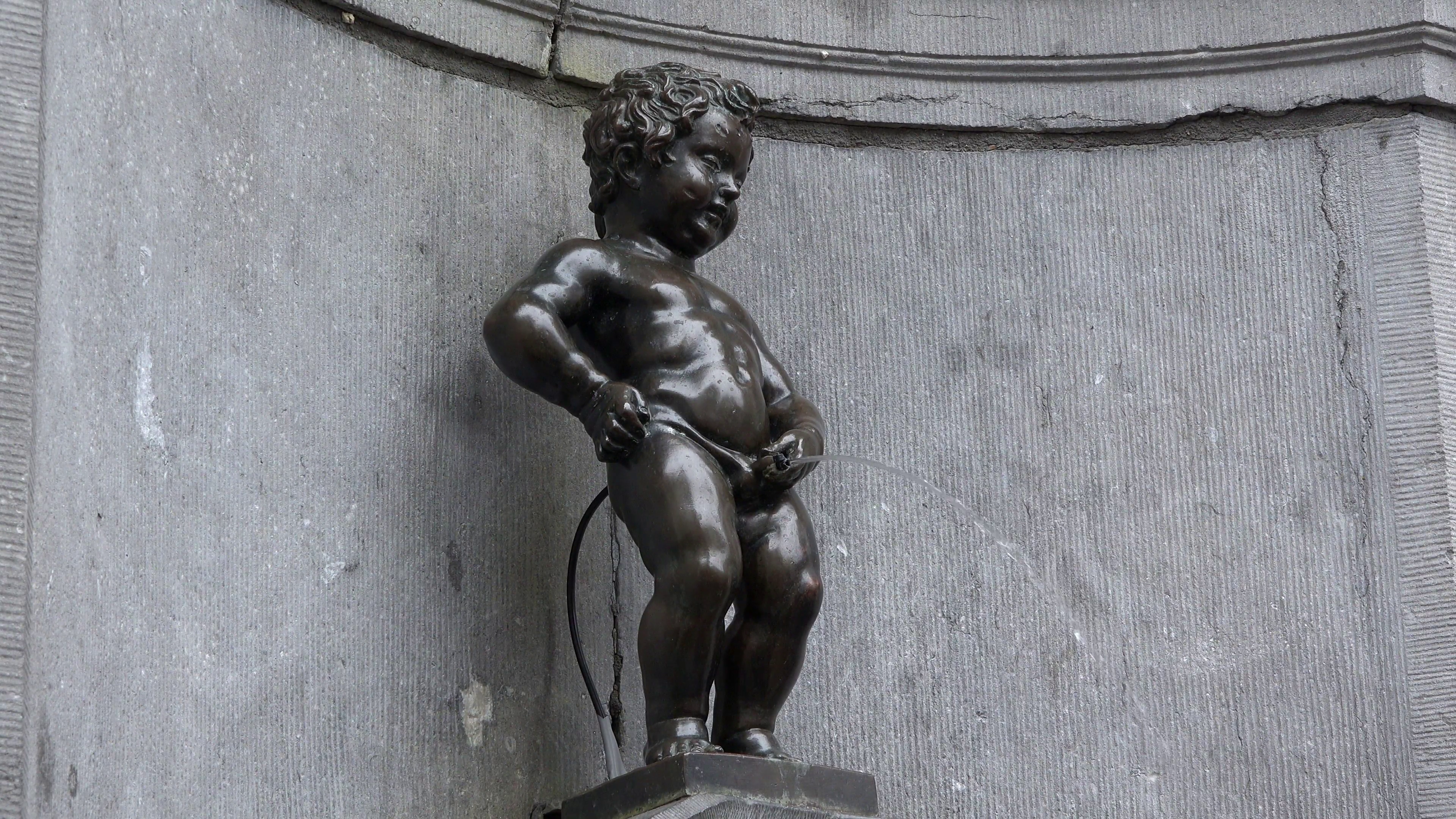 Close view of Manneken Pis statue, symbol of Brussels, Belgium Stock ...