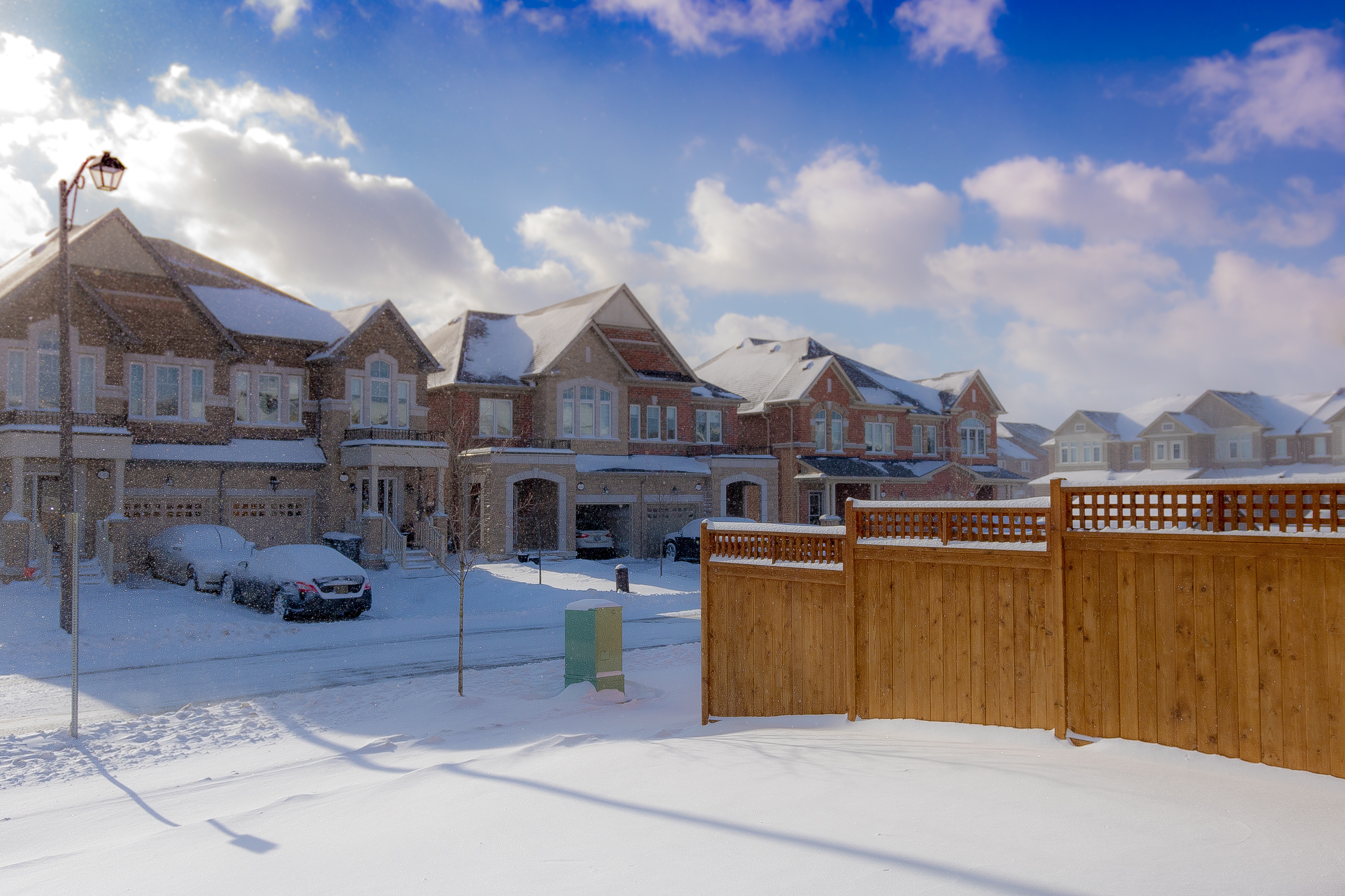 Brown 2-storey houses during snow photo