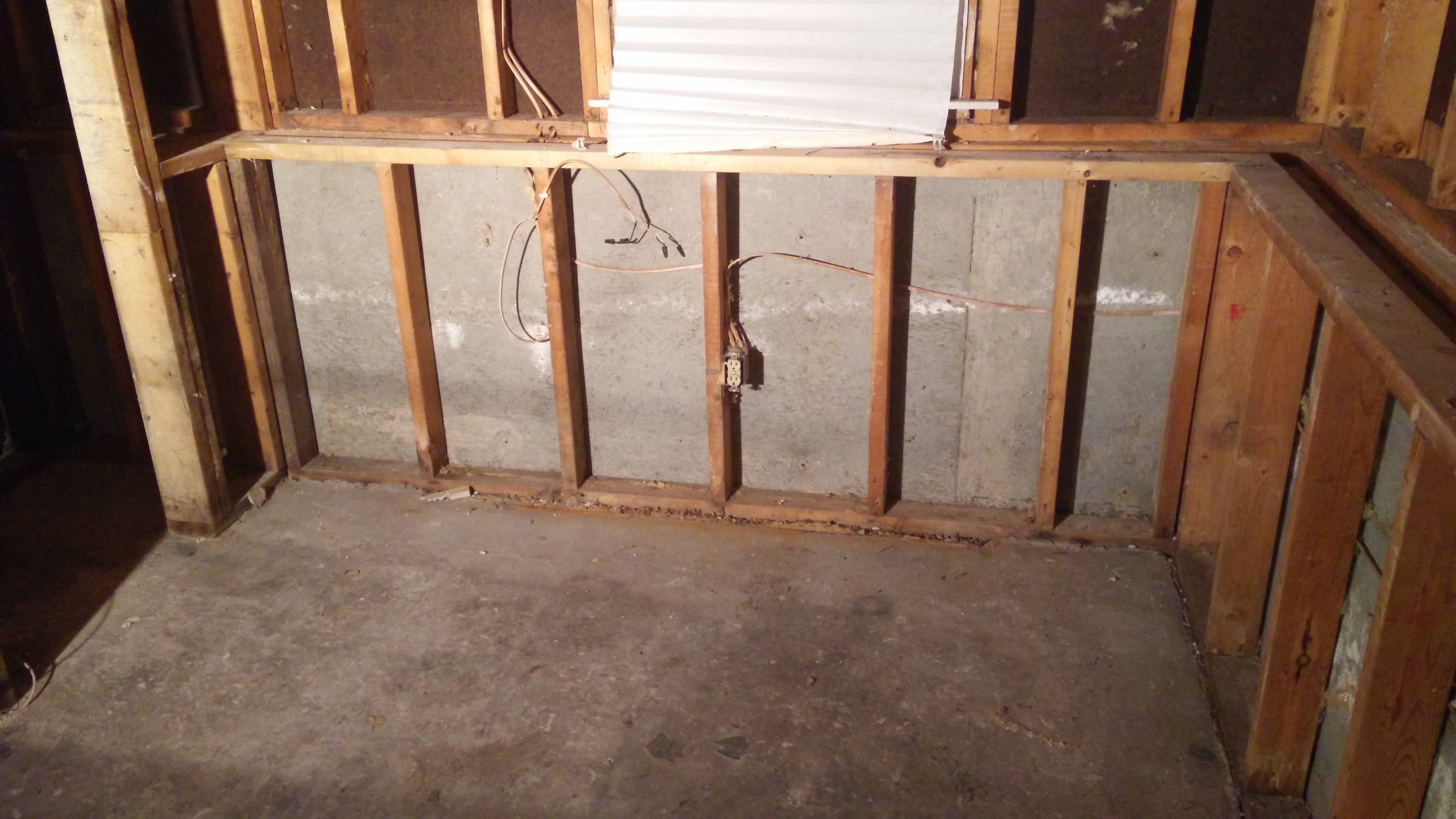 Re-framing basement walls after flooding. Drain tile with no ...