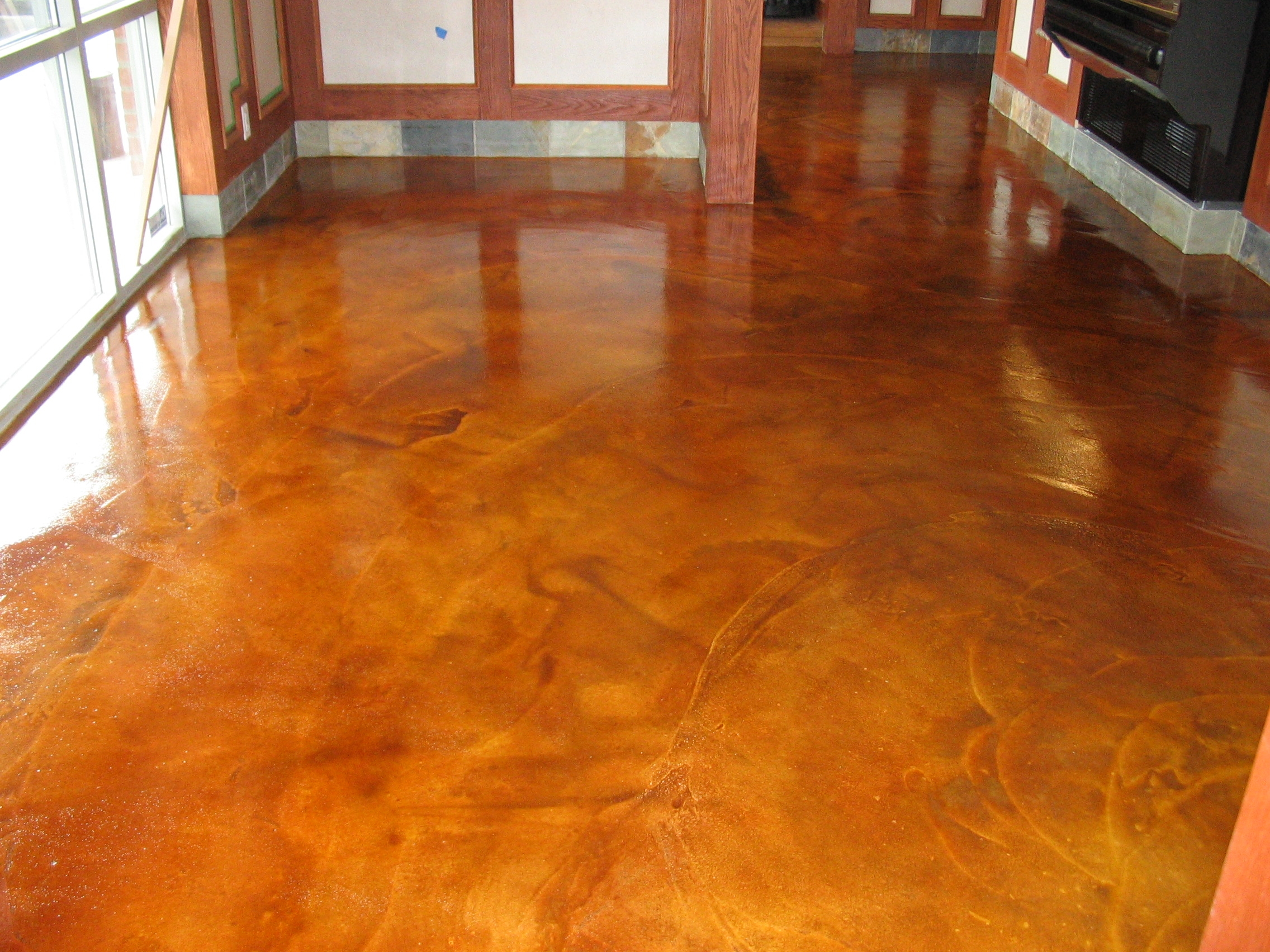 Brown Color Painting Concrete Floor Inside House In The Hallway