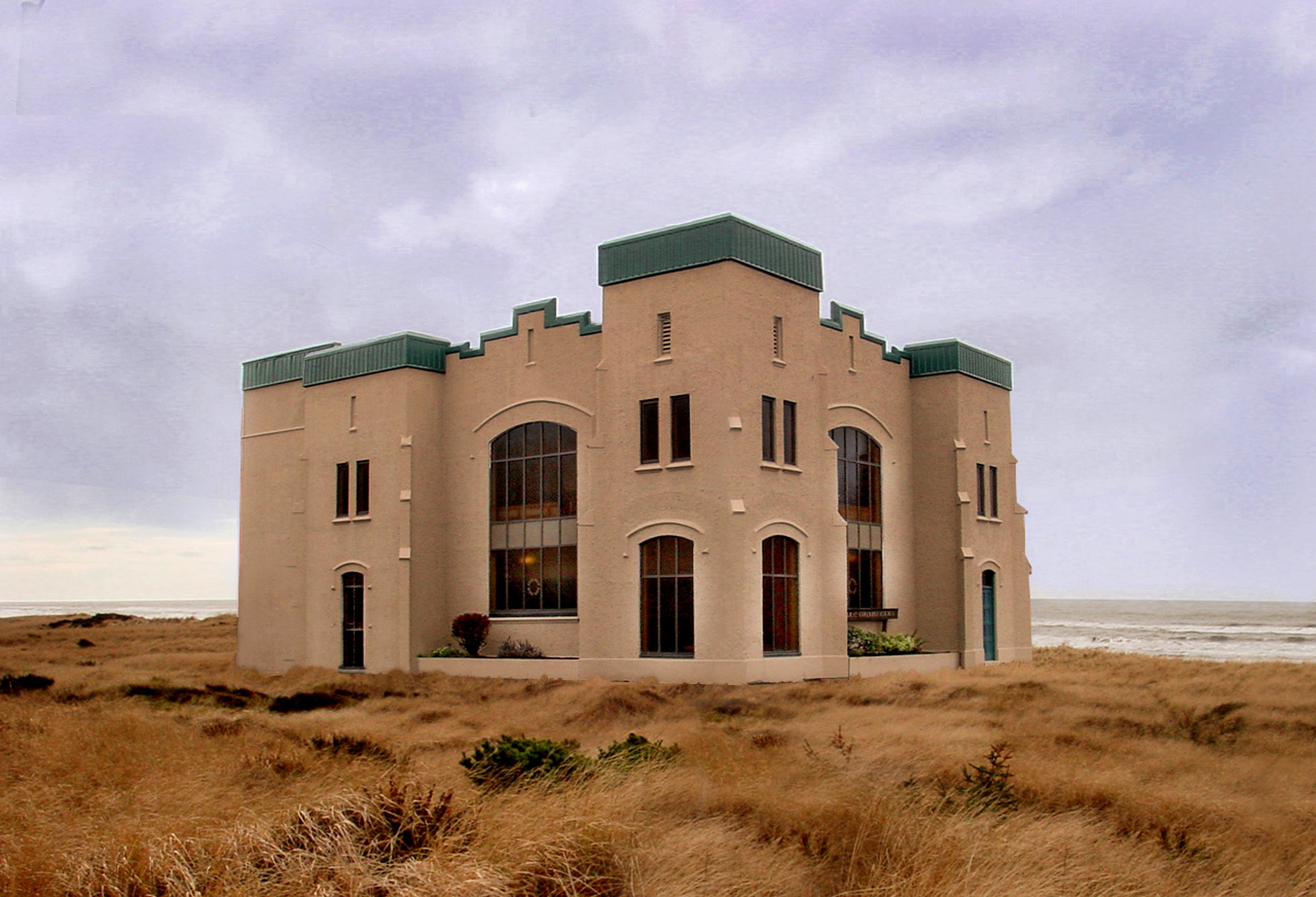 Brown concrete mansion at the middle of nowhere photo
