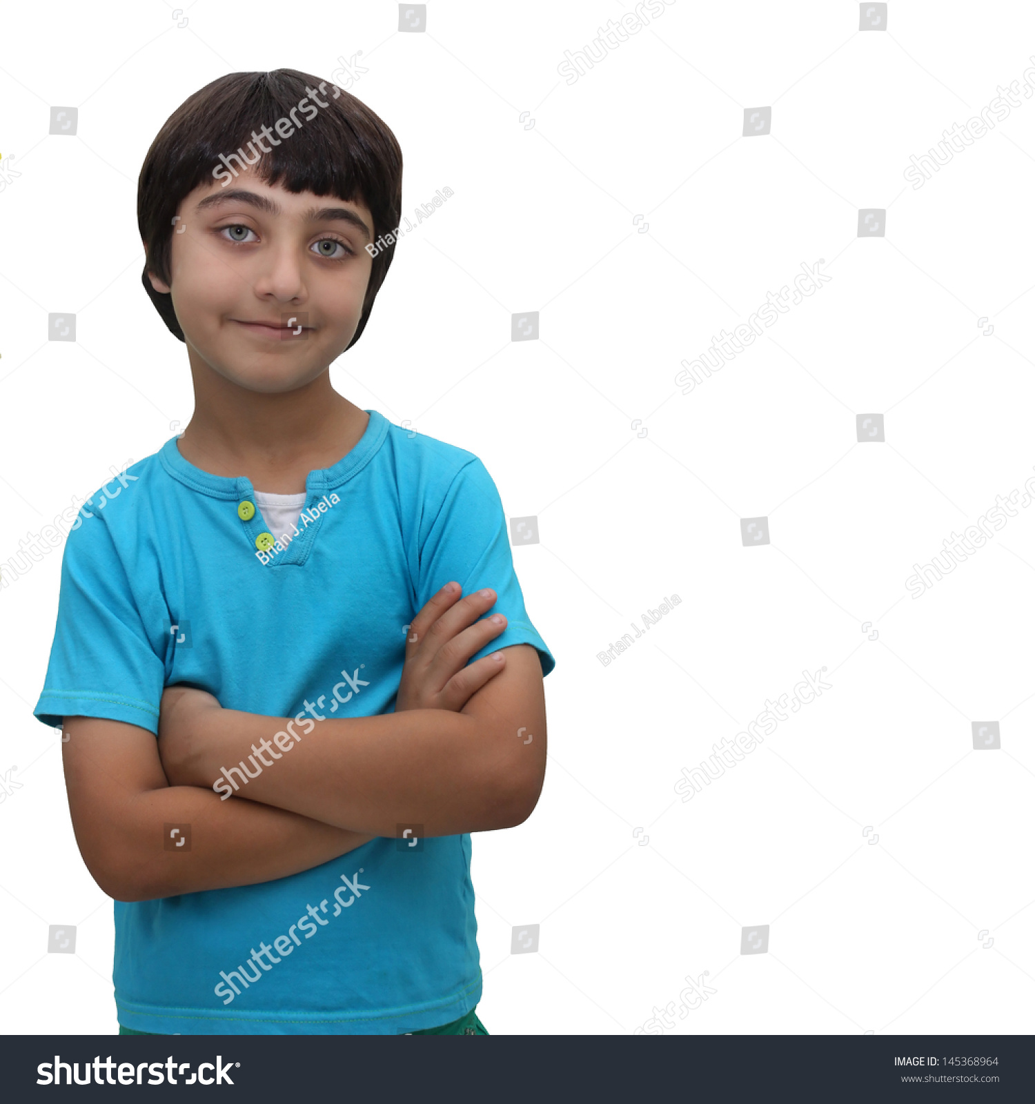 Young Brown Haired Boy Arms Crossed Stock Photo (Royalty Free ...